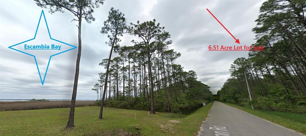 10600 Pearson Road Milton, FL 32583 - Photo 1 of 11 a view of a park with welcome board