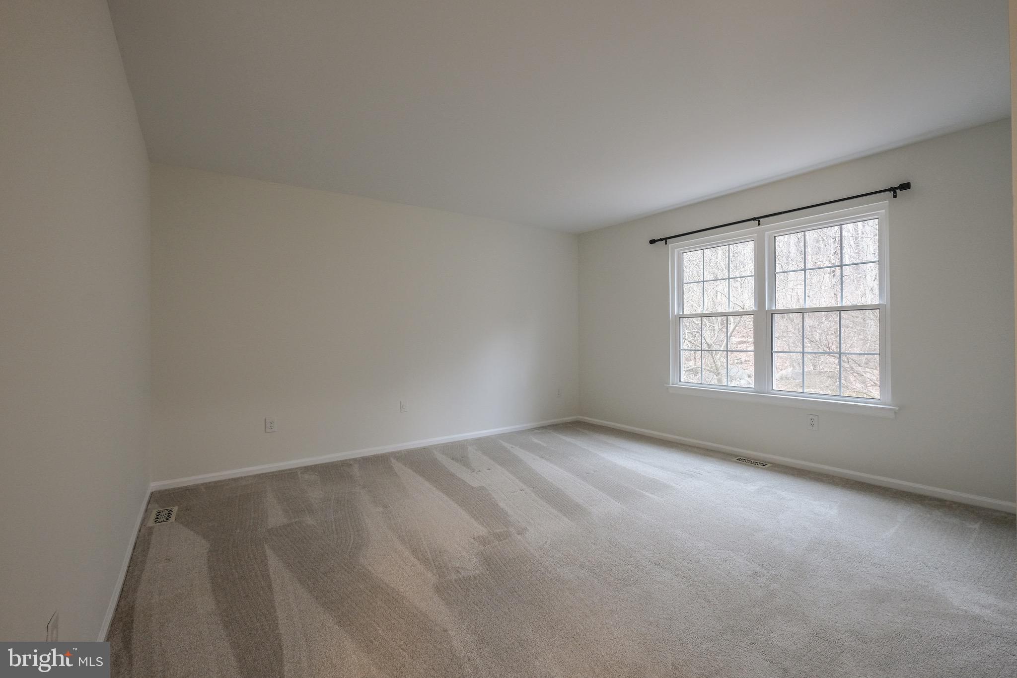 35 C Chicopee Drive Princeton, NJ 08540 - Photo 12 of 24 an empty room with a window