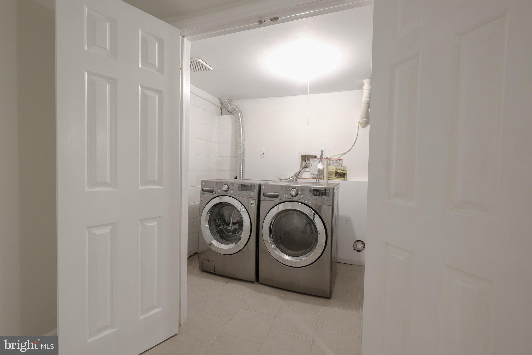 35 C Chicopee Drive Princeton, NJ 08540 - Photo 23 of 24 a utility room with dryer and washer