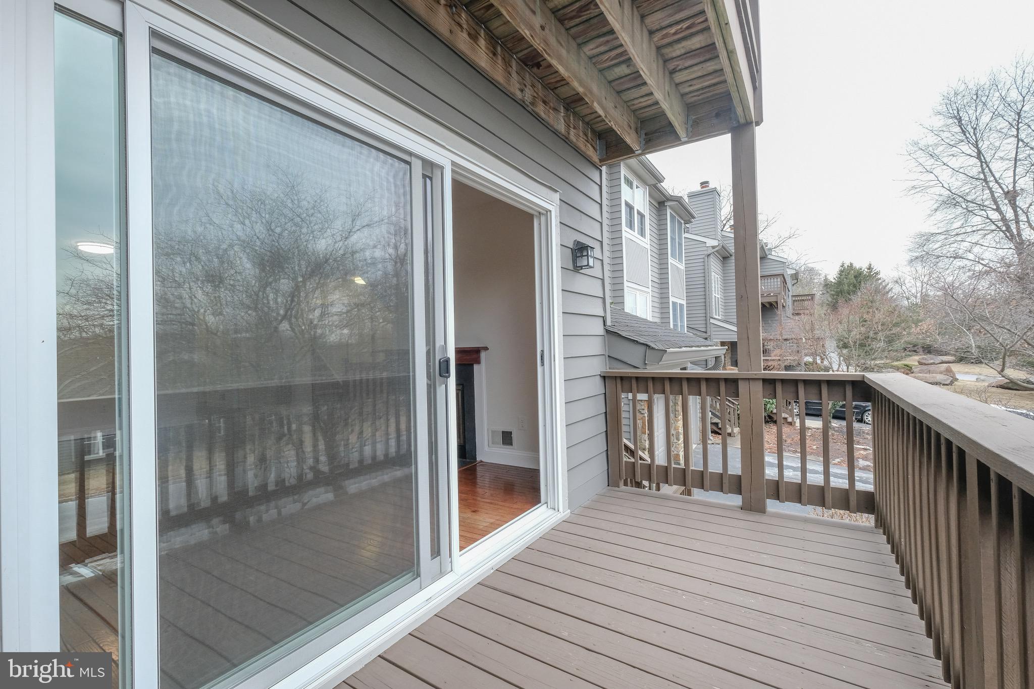 35 C Chicopee Drive Princeton, NJ 08540 - Photo 4 of 24 a balcony with wooden floor