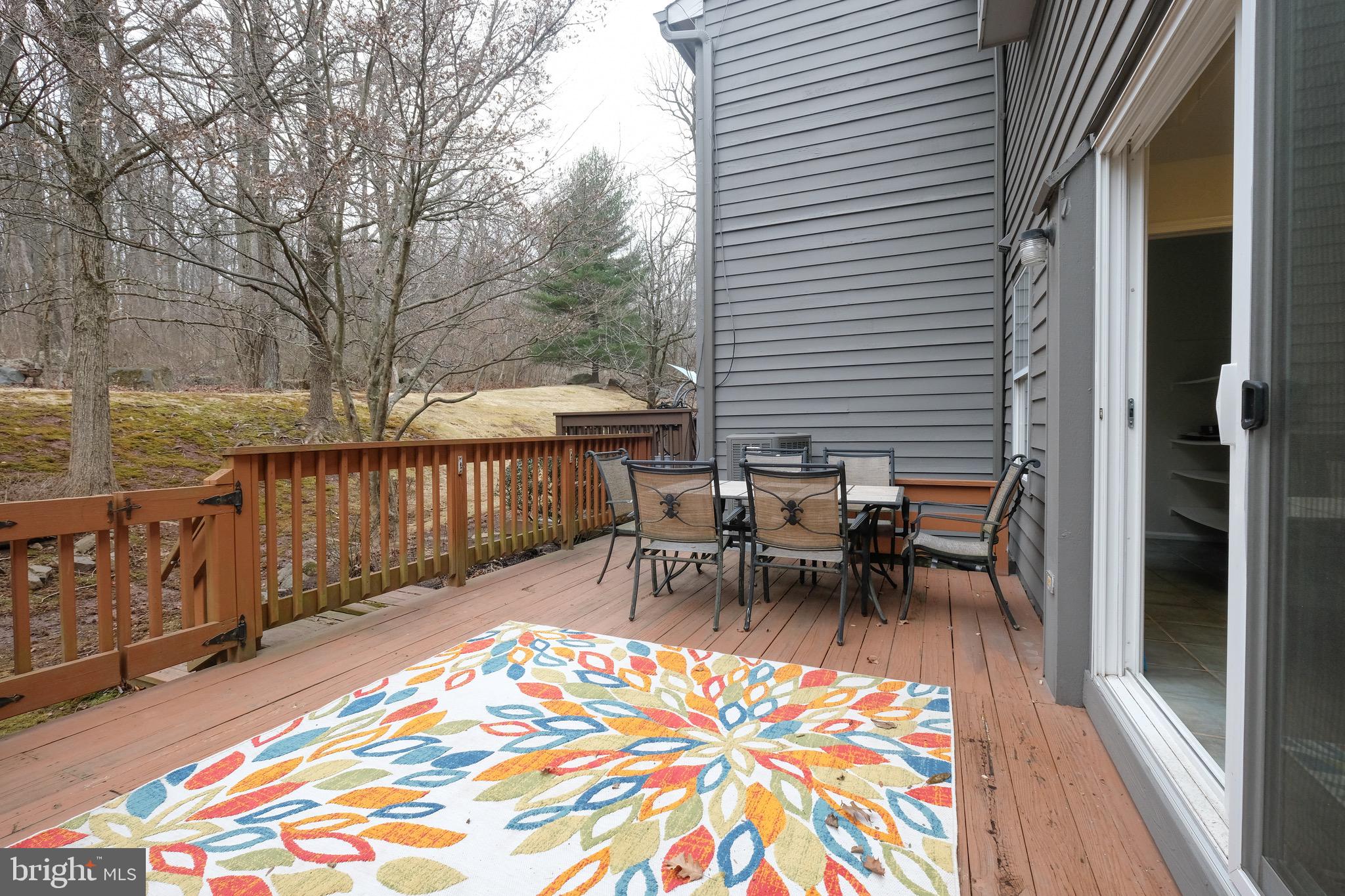 35 C Chicopee Drive Princeton, NJ 08540 - Photo 8 of 24 a view of balcony with wooden floor and outdoor seating