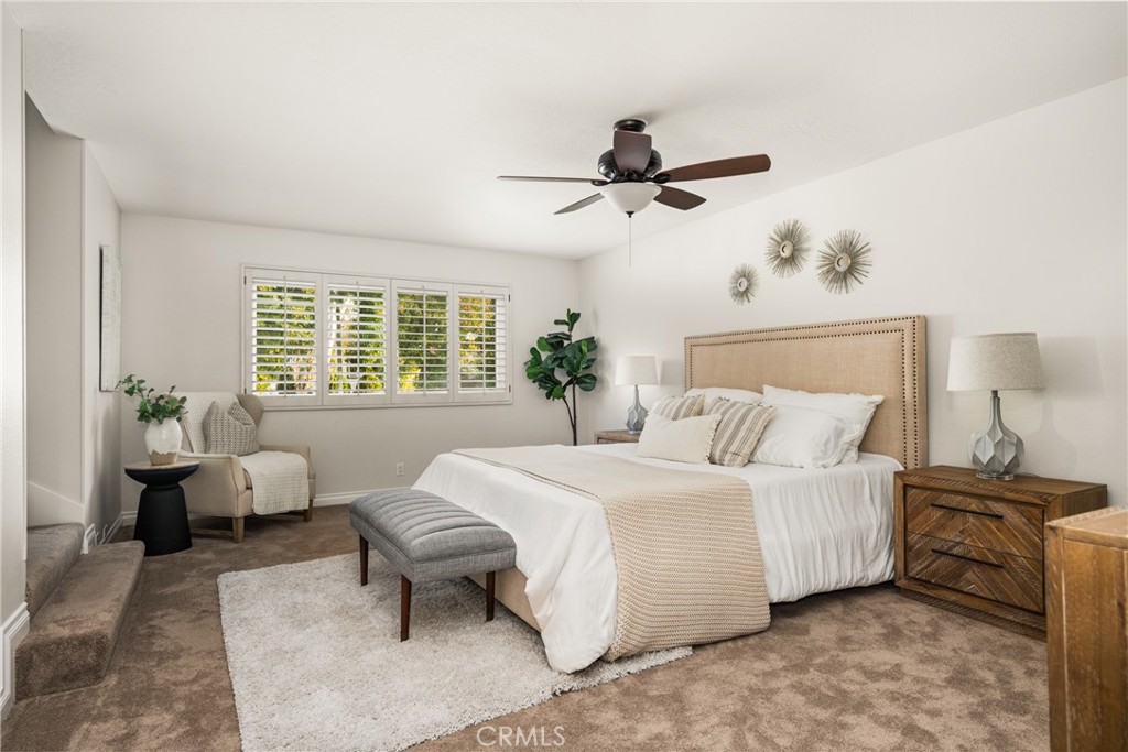 4 Abeto Irvine, CA 92620 - Photo 12 of 29 a bedroom with a bed and a couch