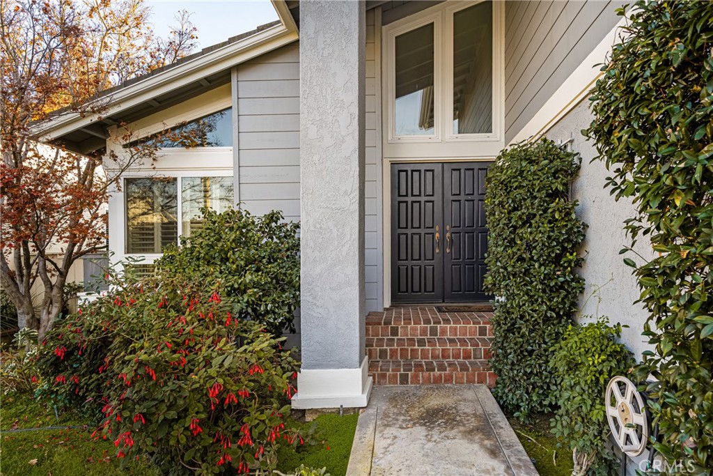 4 Abeto Irvine, CA 92620 - Photo 2 of 29 a front view of a house with a garden