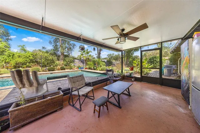 a view of a dining room with furniture window and outside view