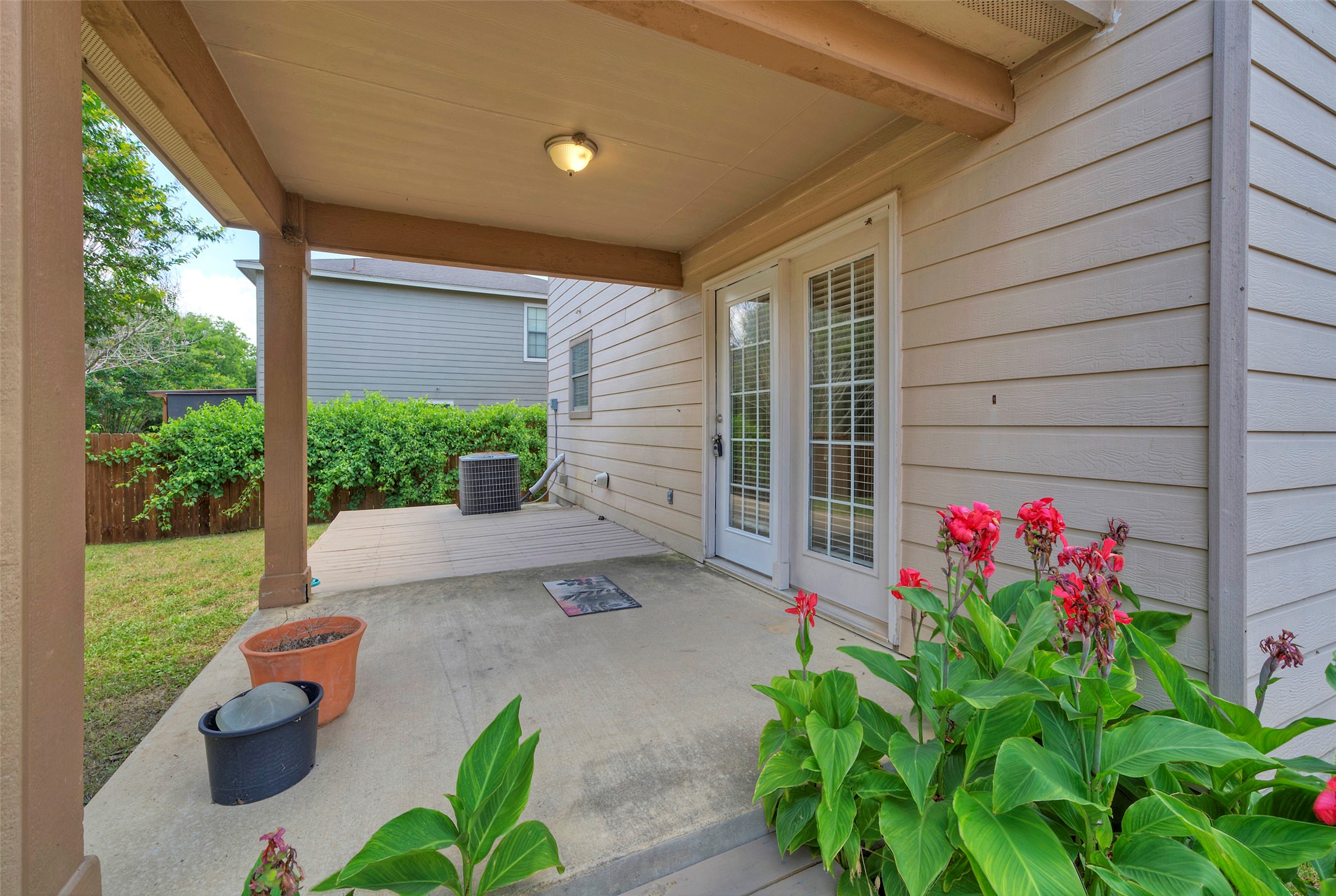 140 Plum Path Kyle, TX 78640 - Photo 17 of 22 a backyard of a house with outdoor seating