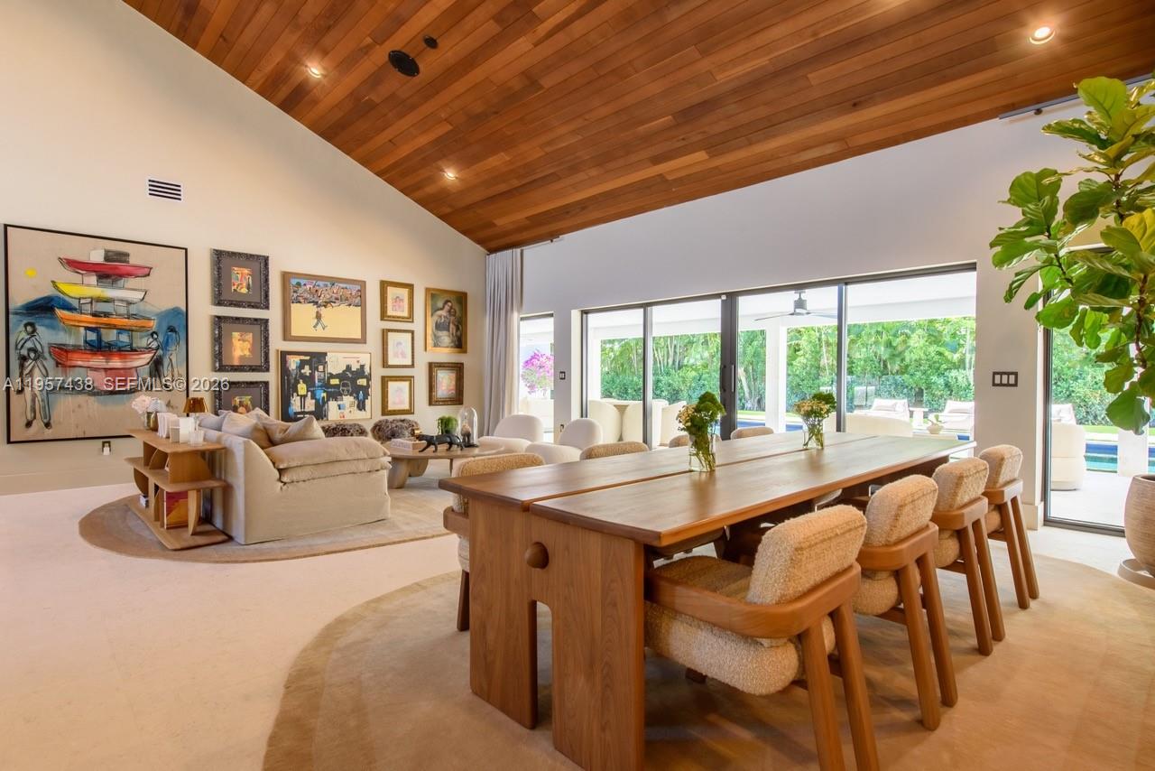 5902 Southwest 105th Street Pinecrest, FL 33156 - Photo 20 of 31 a dining room with furniture water view and a potted plant