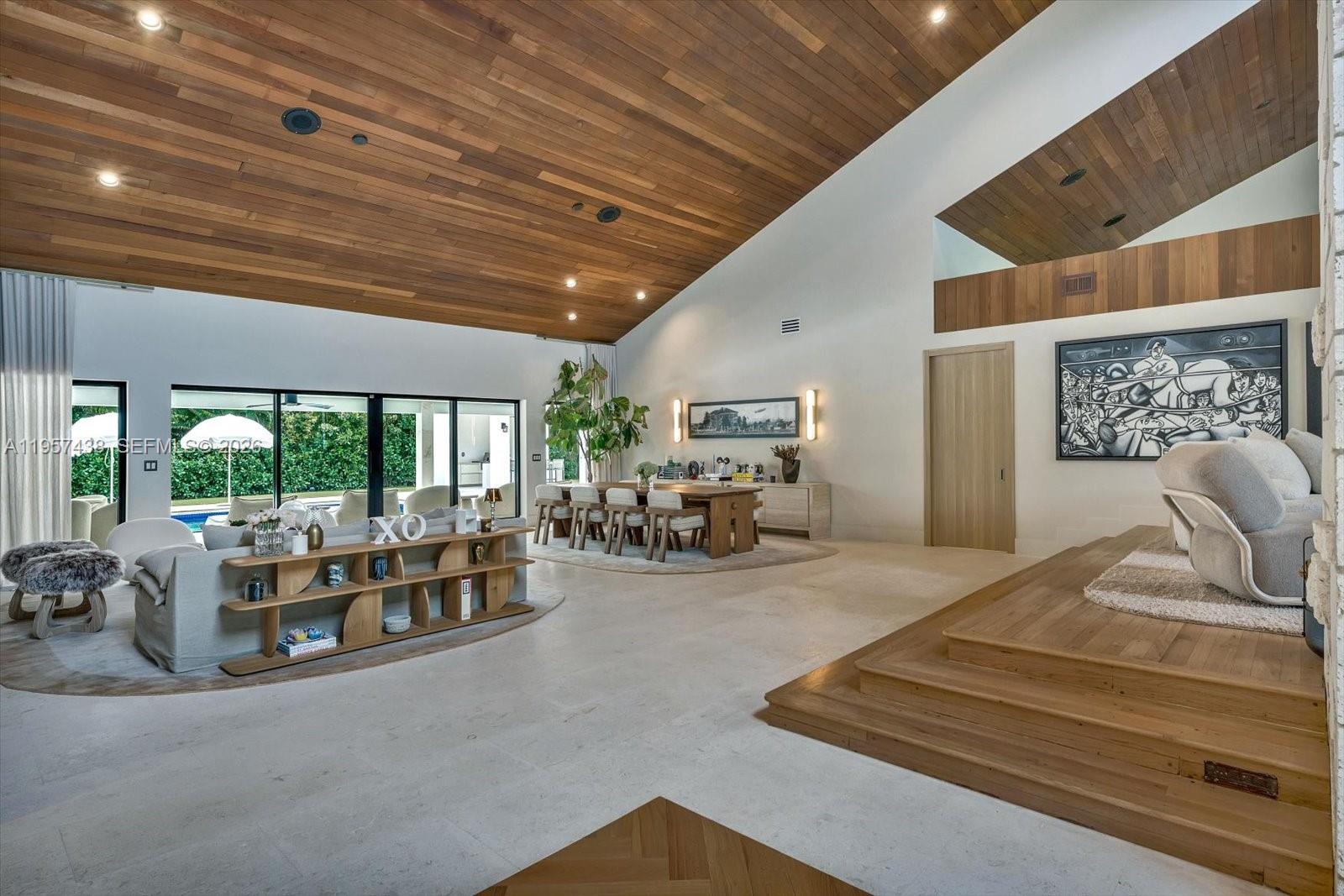 5902 Southwest 105th Street Pinecrest, FL 33156 - Photo 24 of 30 a view of a livingroom with furniture and floor to ceiling window