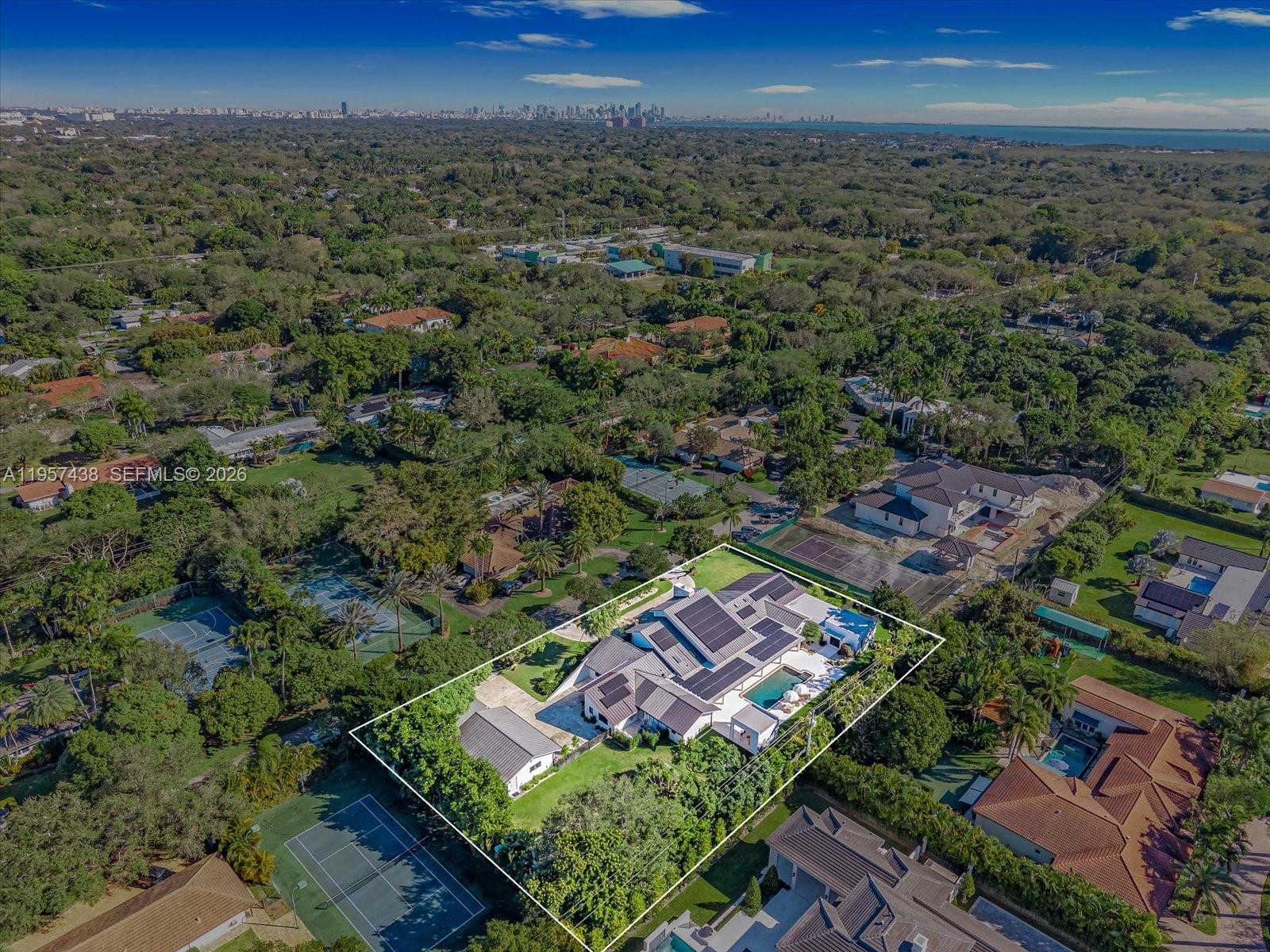 5902 Southwest 105th Street Pinecrest, FL 33156 - Photo 28 of 30 an aerial view of multiple house