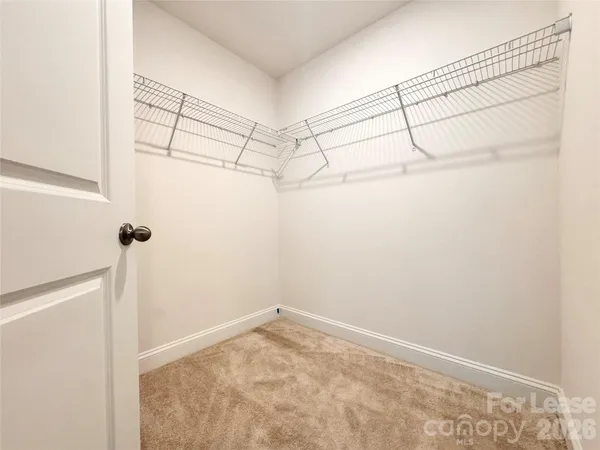 a view of a room with racks on the wall