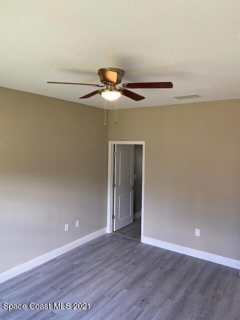 1110 Commerce Road Southeast Palm Bay, FL 32909 - Photo 8 of 12 Master Bedroom