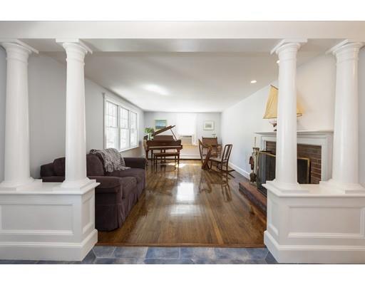 32 Bennett Road Marblehead, MA 01945 - Photo 3 of 24 a living room with fireplace furniture and a flat screen tv