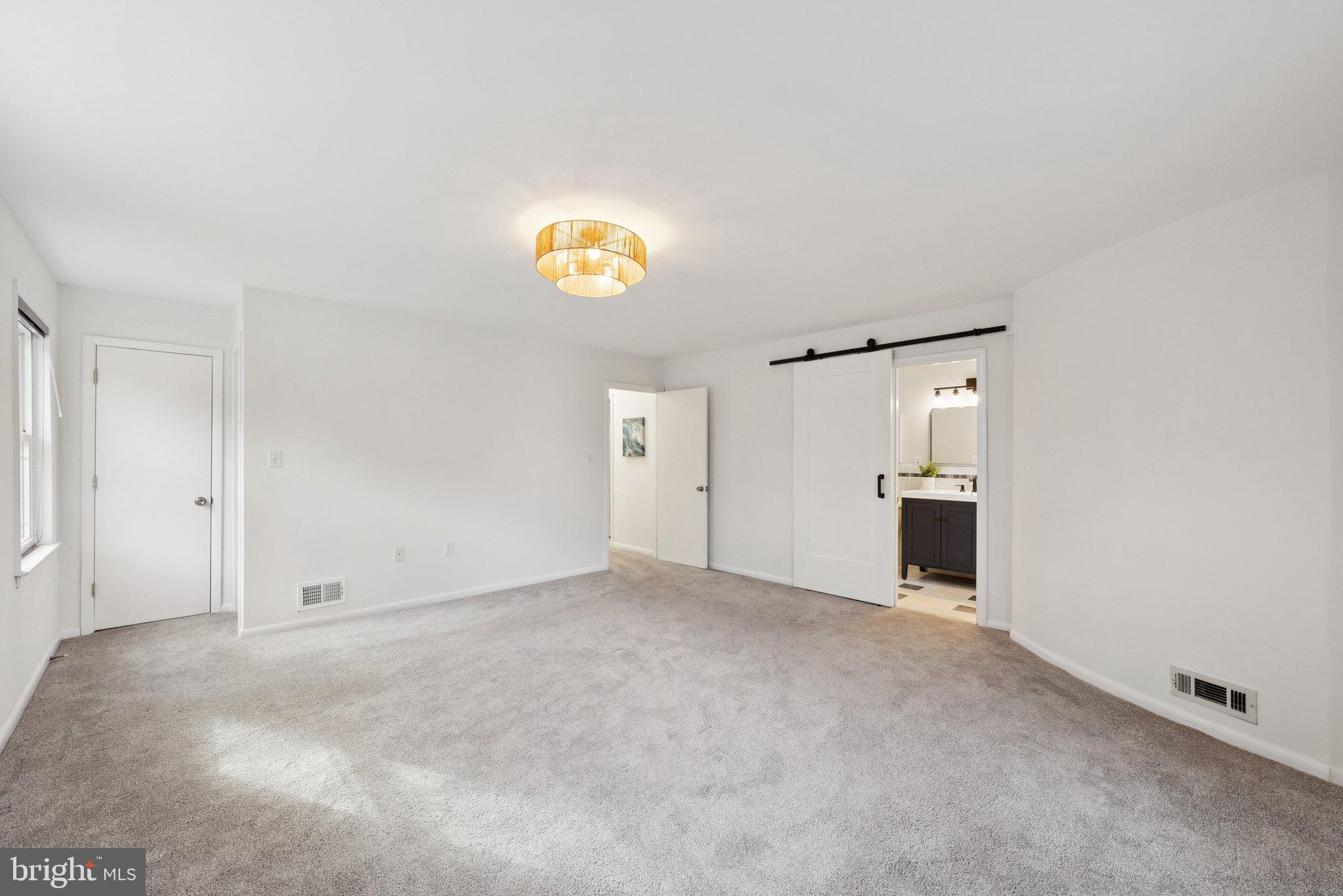 2404 Blue Valley Drive Silver Spring, MD 20904 - Photo 18 of 46 Spacious primary bedroom w/new barn door to bath!
