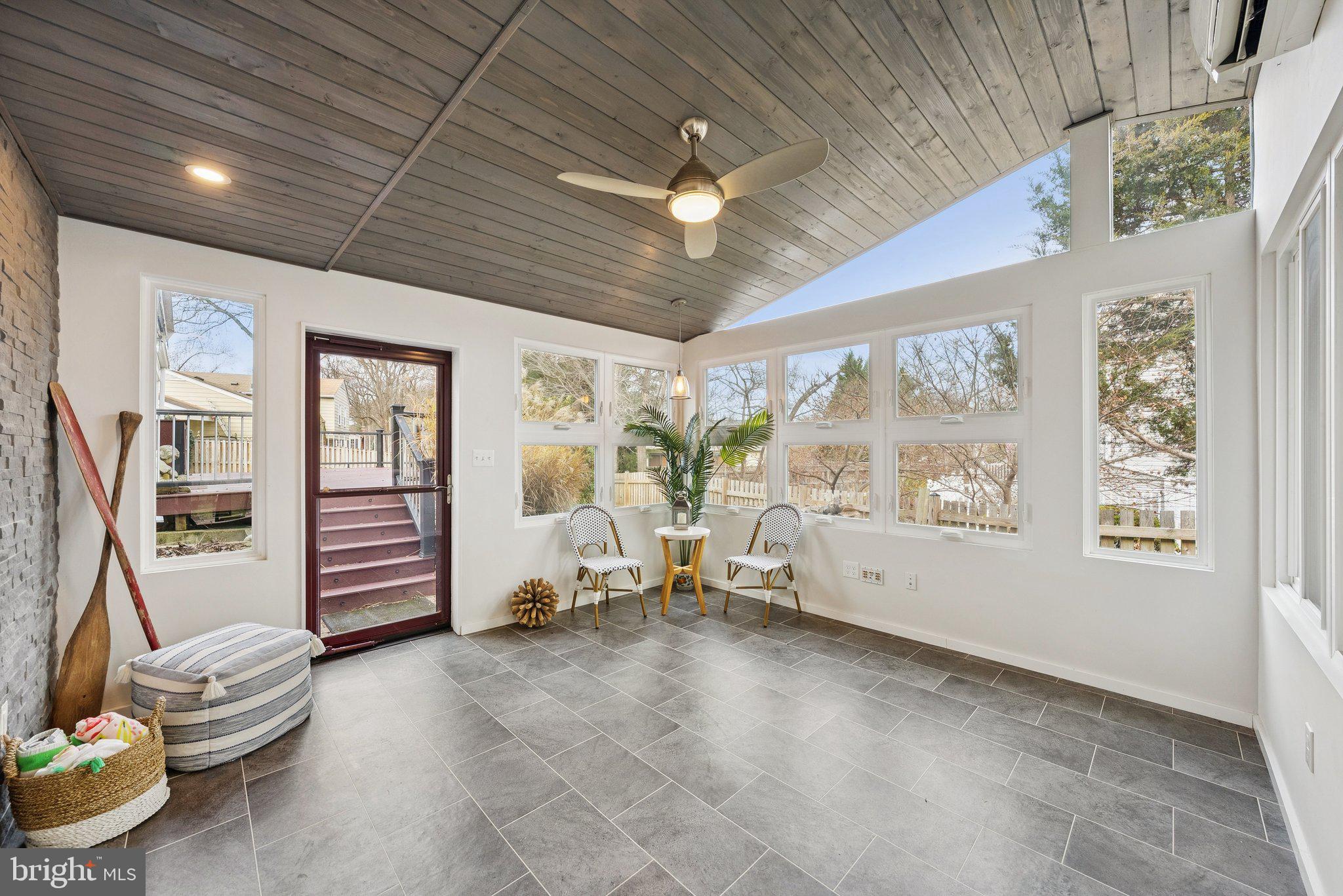 2404 Blue Valley Drive Silver Spring, MD 20904 - Photo 29 of 46 Lined with windows and wide-plank tile flooring