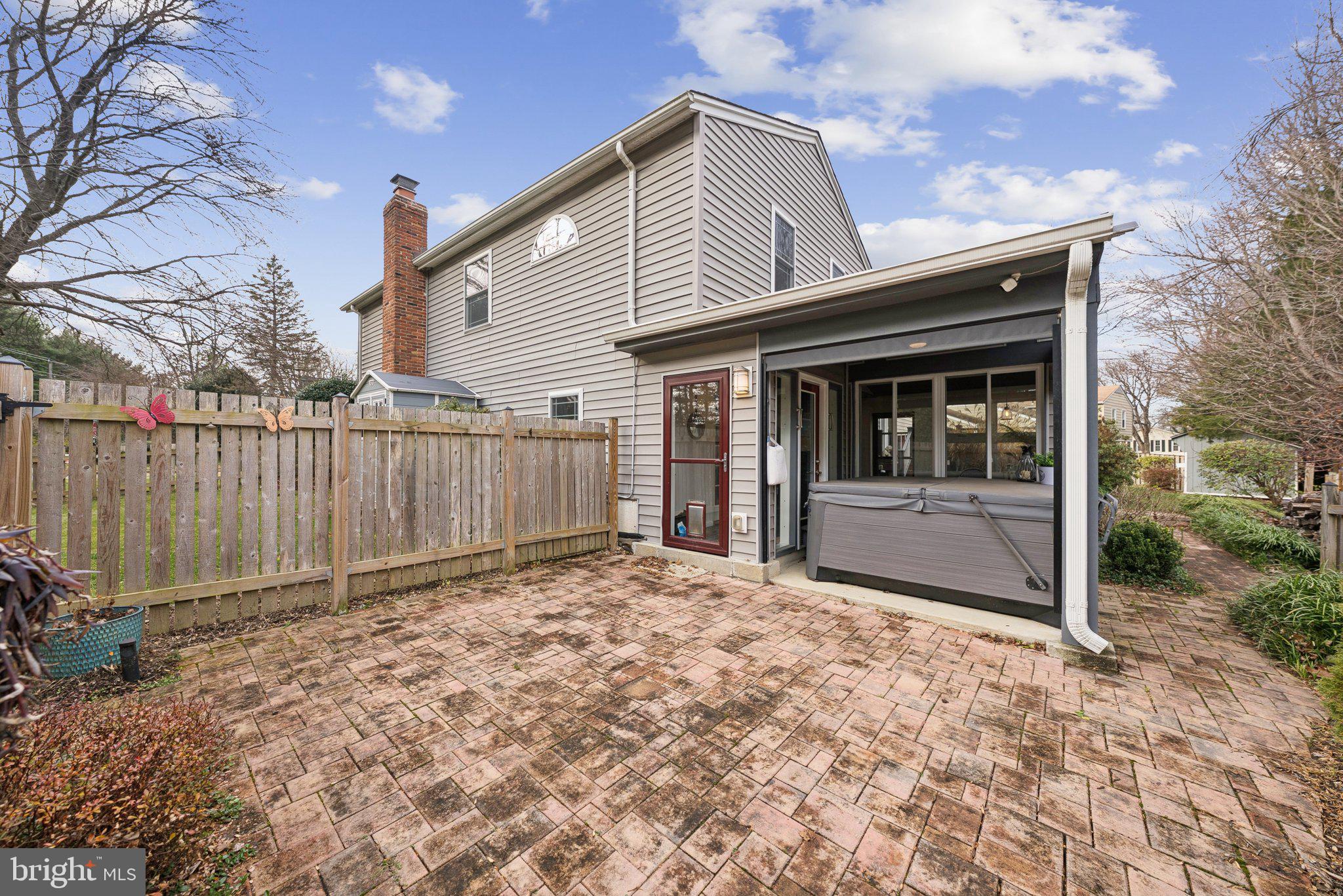 2404 Blue Valley Drive Silver Spring, MD 20904 - Photo 43 of 46 Another angle of the paver patio off sunroom & spa