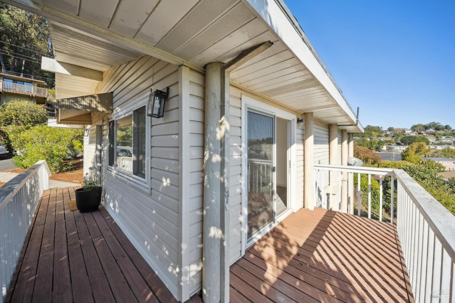 16 Dutton Court Sausalito, CA 94965 - Photo 16 of 42 a view of balcony with wooden floor and outdoor seating