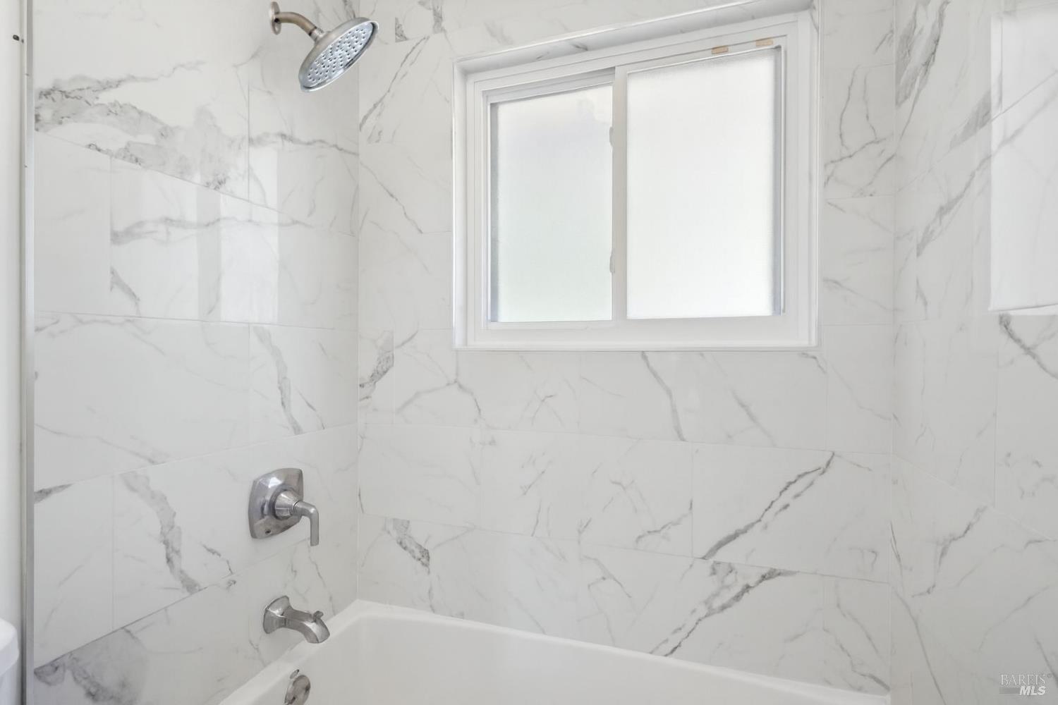 16 Dutton Court Sausalito, CA 94965 - Photo 27 of 42 a bathroom with a bathtub and shower