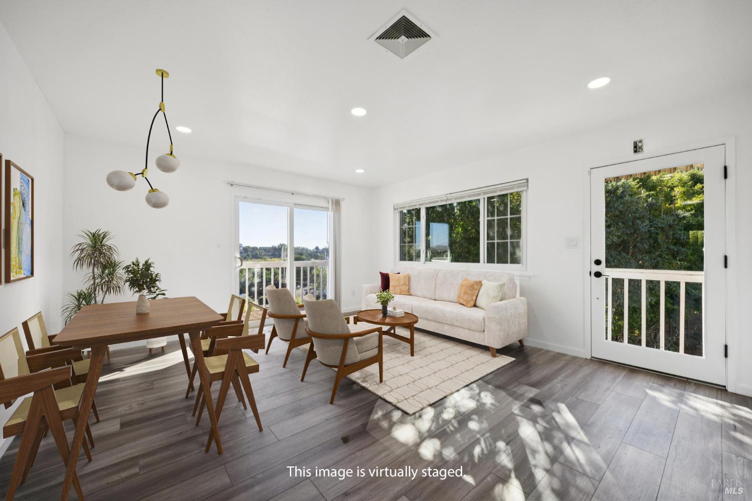 16 Dutton Court Sausalito, CA 94965 - Photo 3 of 42 a living room with furniture a window and wooden floor