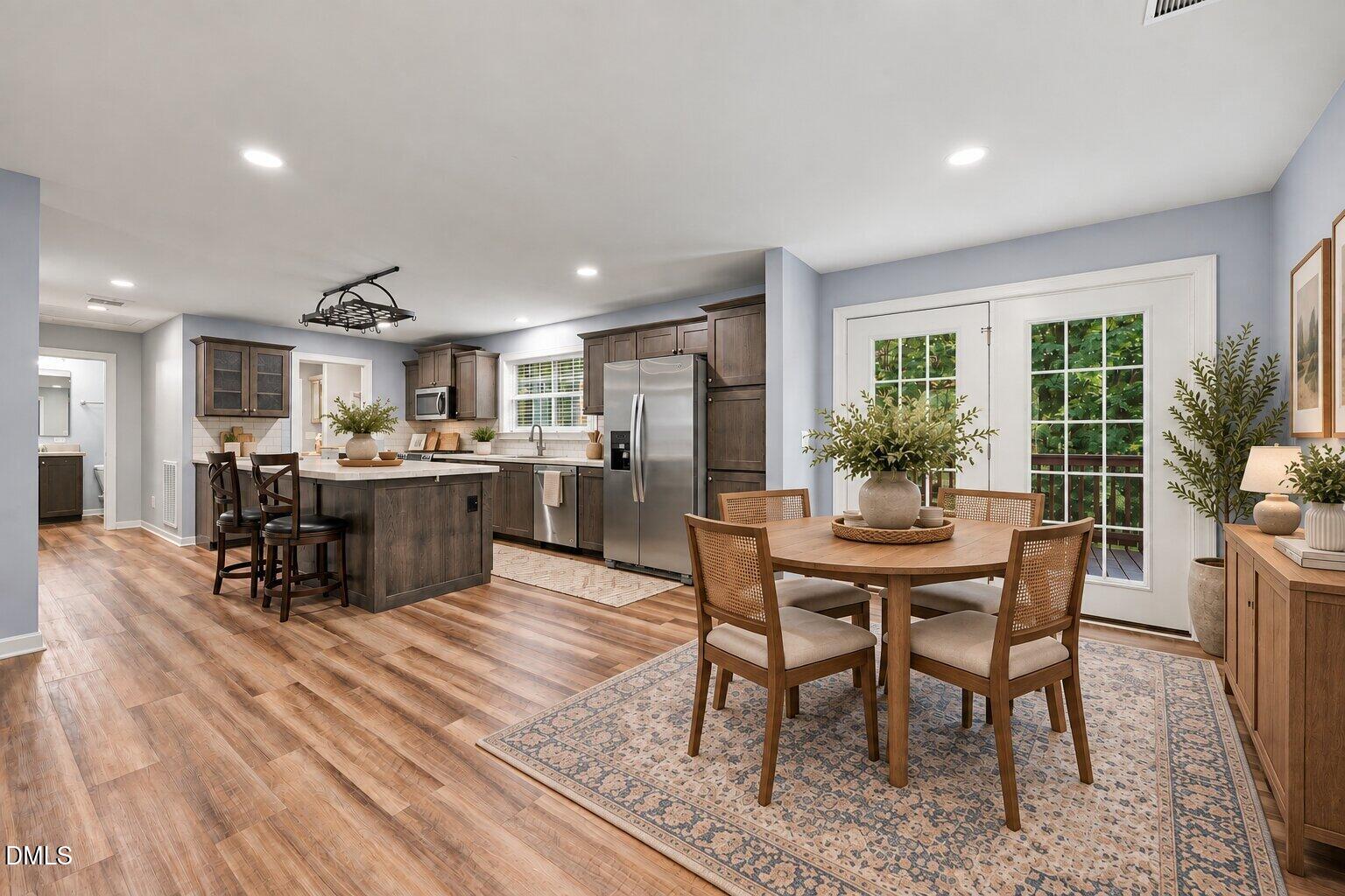 5665 Baptist Assembly Road Julian, NC 27283 - Photo 8 of 46 Dining Room & Kitchen - image has been virtually staged