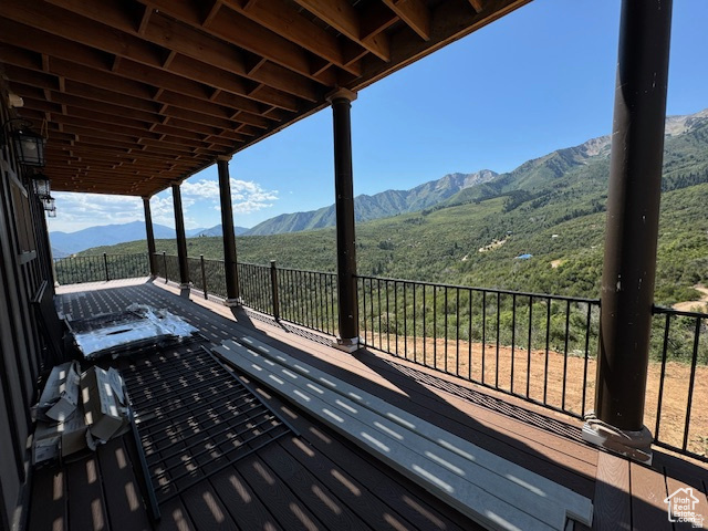6909 East Spring Drive, Unit 19 Springville, UT 84663 - Photo 66 of 118 Expansive outdoor deck featuring composite decking and black wrought iron railings
