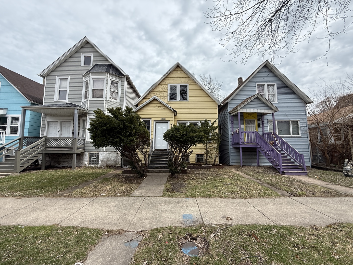 7919 South Escanaba Avenue Chicago, IL 60617 - Photo 1 of 13 a front view of a house with a yard and garage