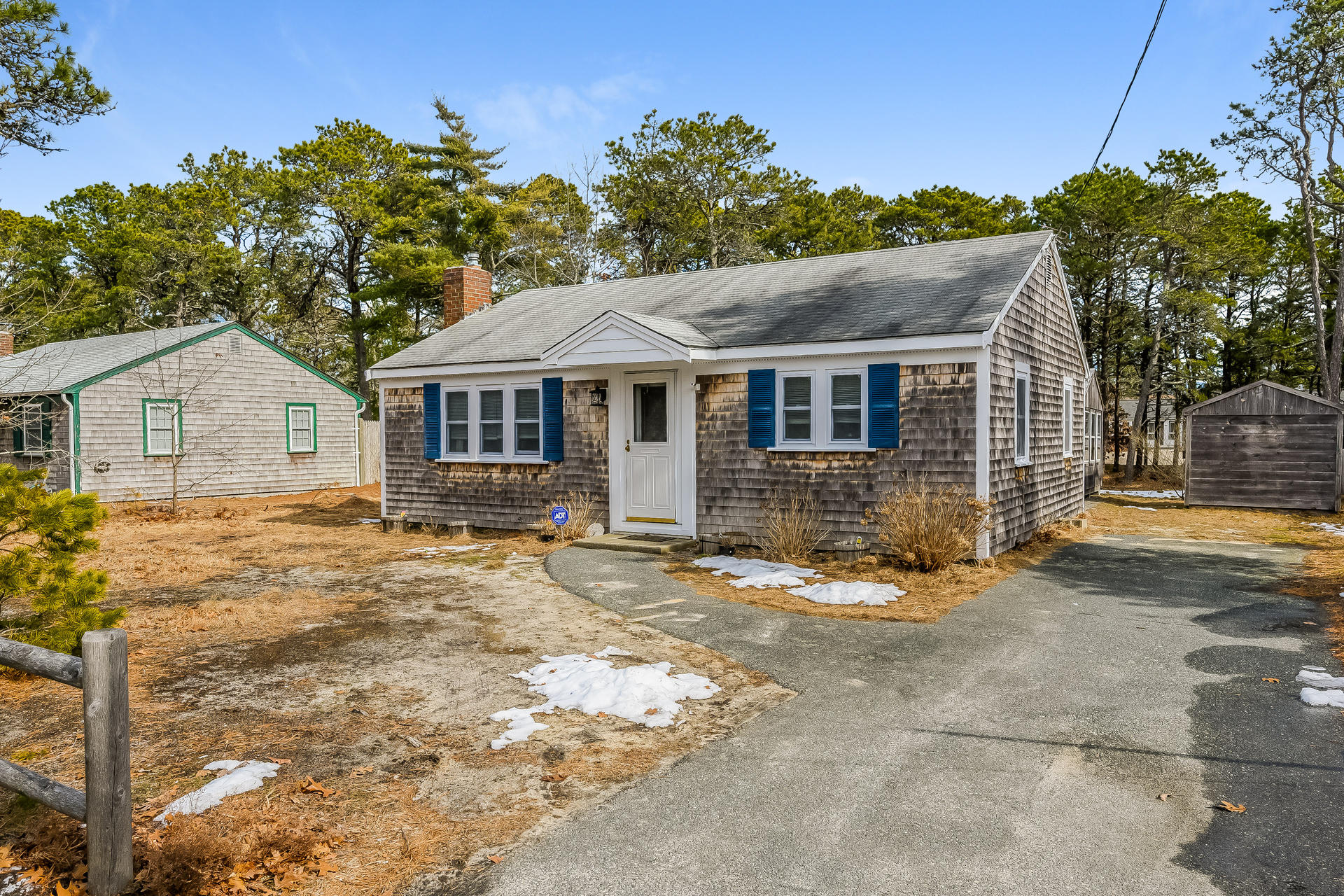 28 Lawrence Road Dennis Port, MA 02639 - Photo 1 of 20 a view of a yard in front of a house with large tree