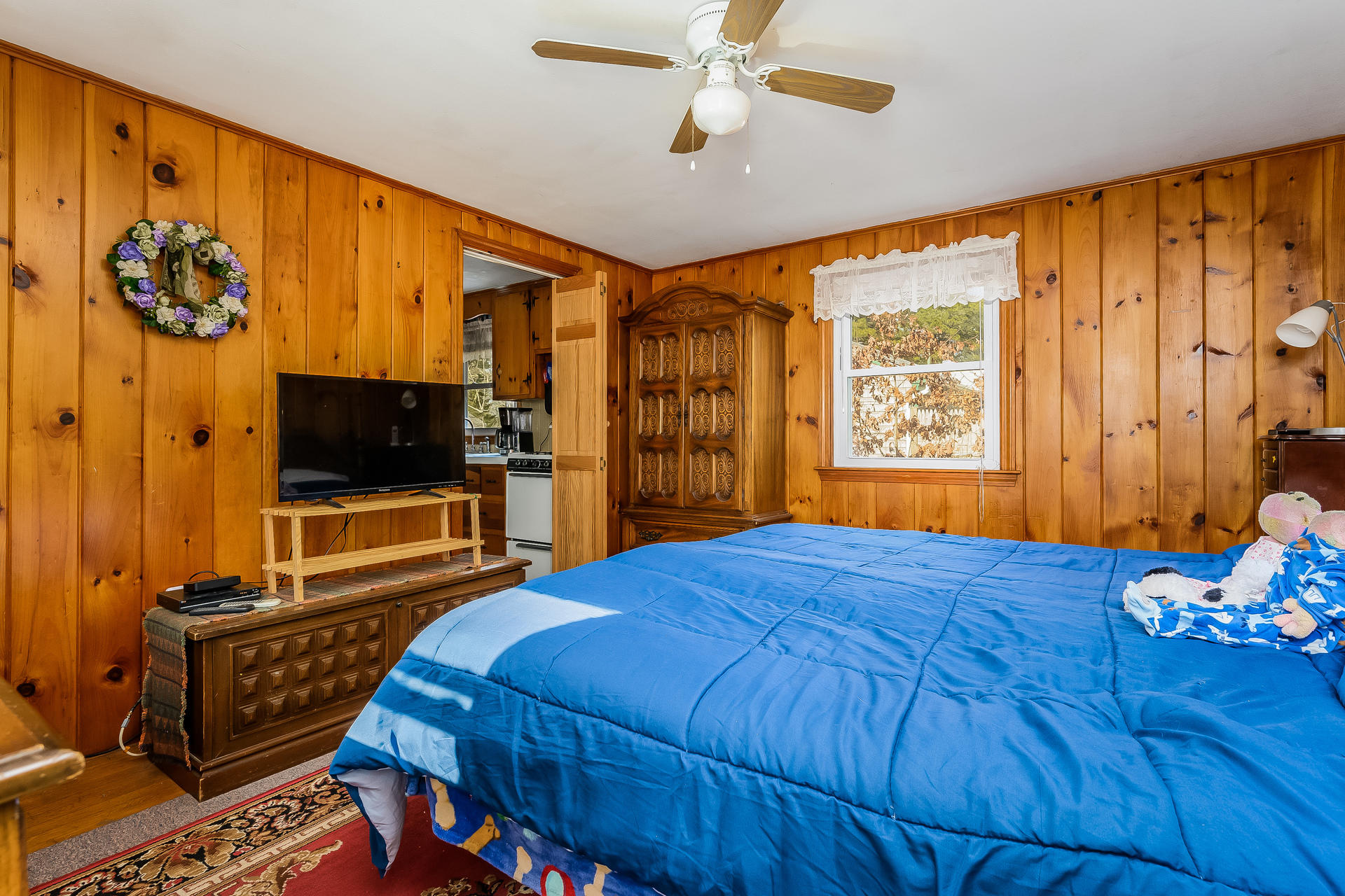 28 Lawrence Road Dennis Port, MA 02639 - Photo 14 of 20 a bedroom with a bed and a flat screen tv