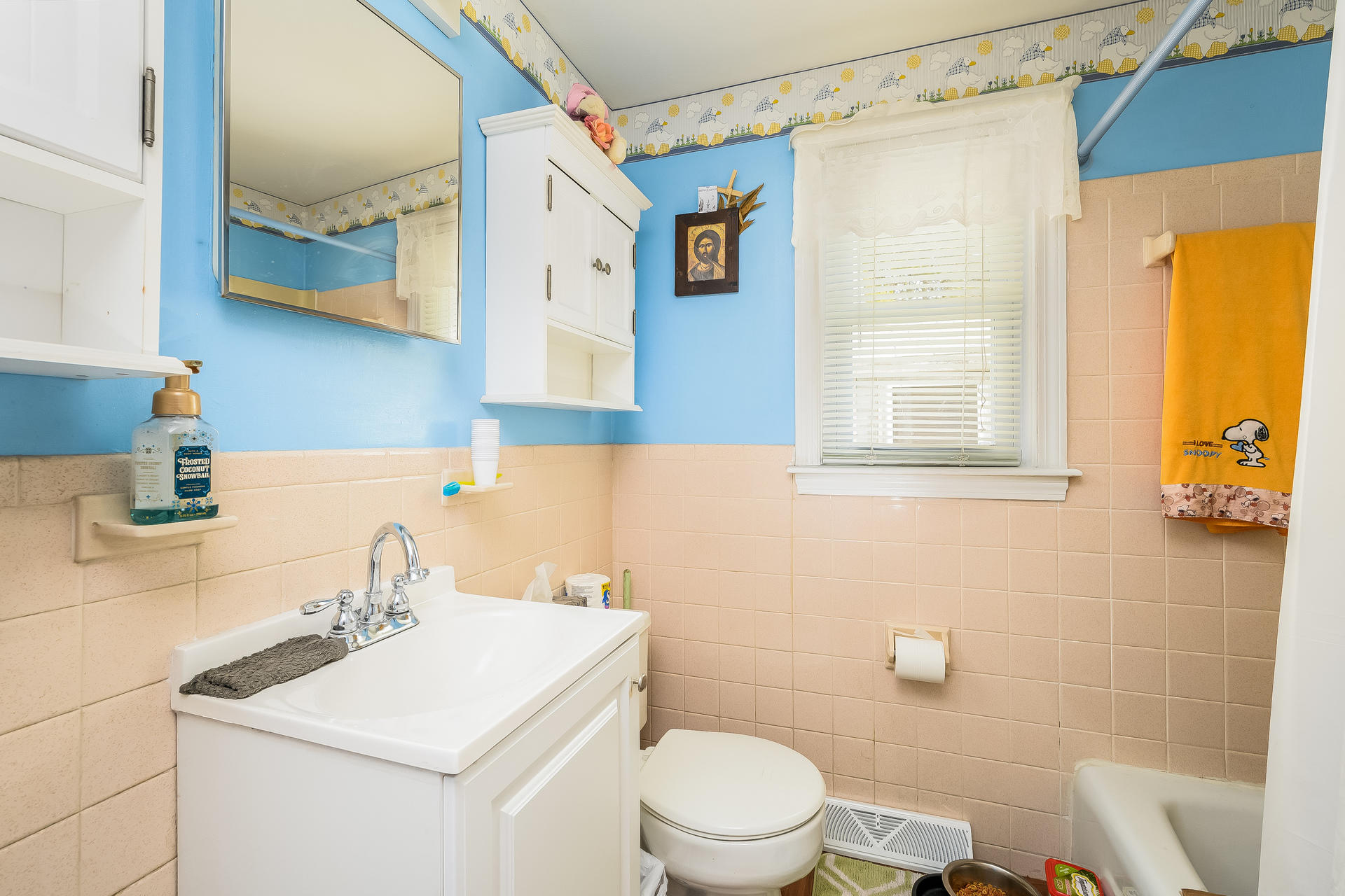 28 Lawrence Road Dennis Port, MA 02639 - Photo 20 of 20 a bathroom with a sink a toilet and shower curtain