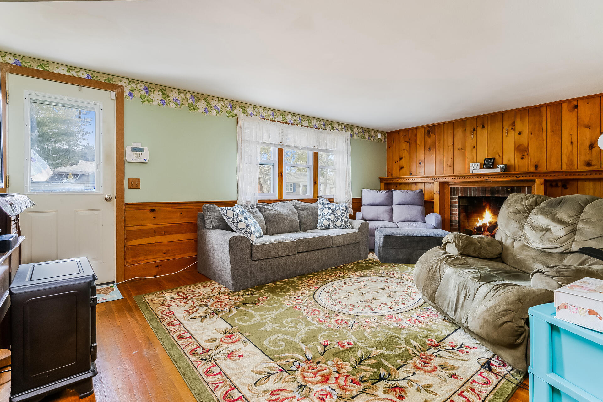 28 Lawrence Road Dennis Port, MA 02639 - Photo 6 of 20 a living room with furniture and a fireplace