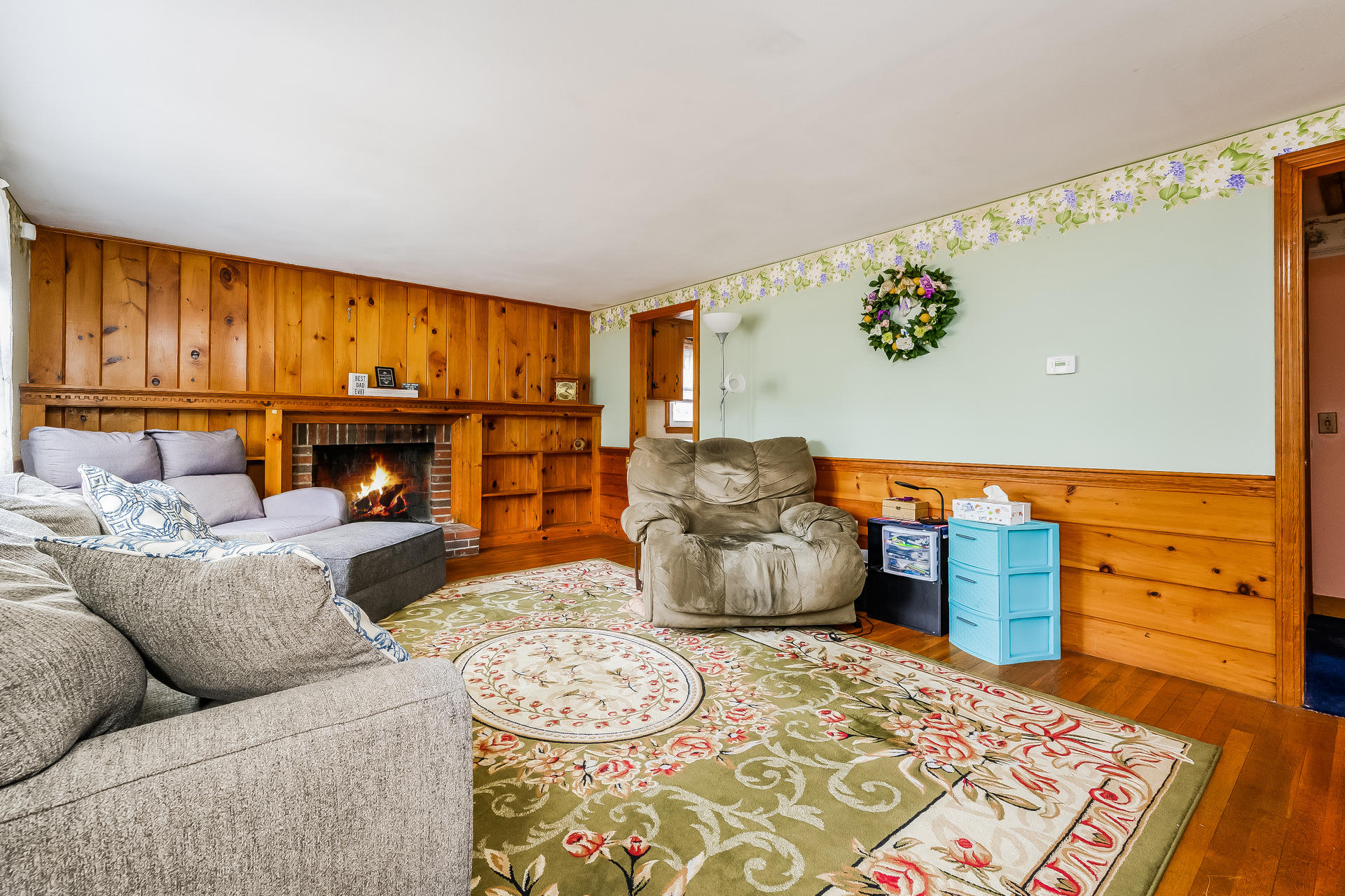 28 Lawrence Road Dennis Port, MA 02639 - Photo 7 of 20 a living room with furniture and a fireplace