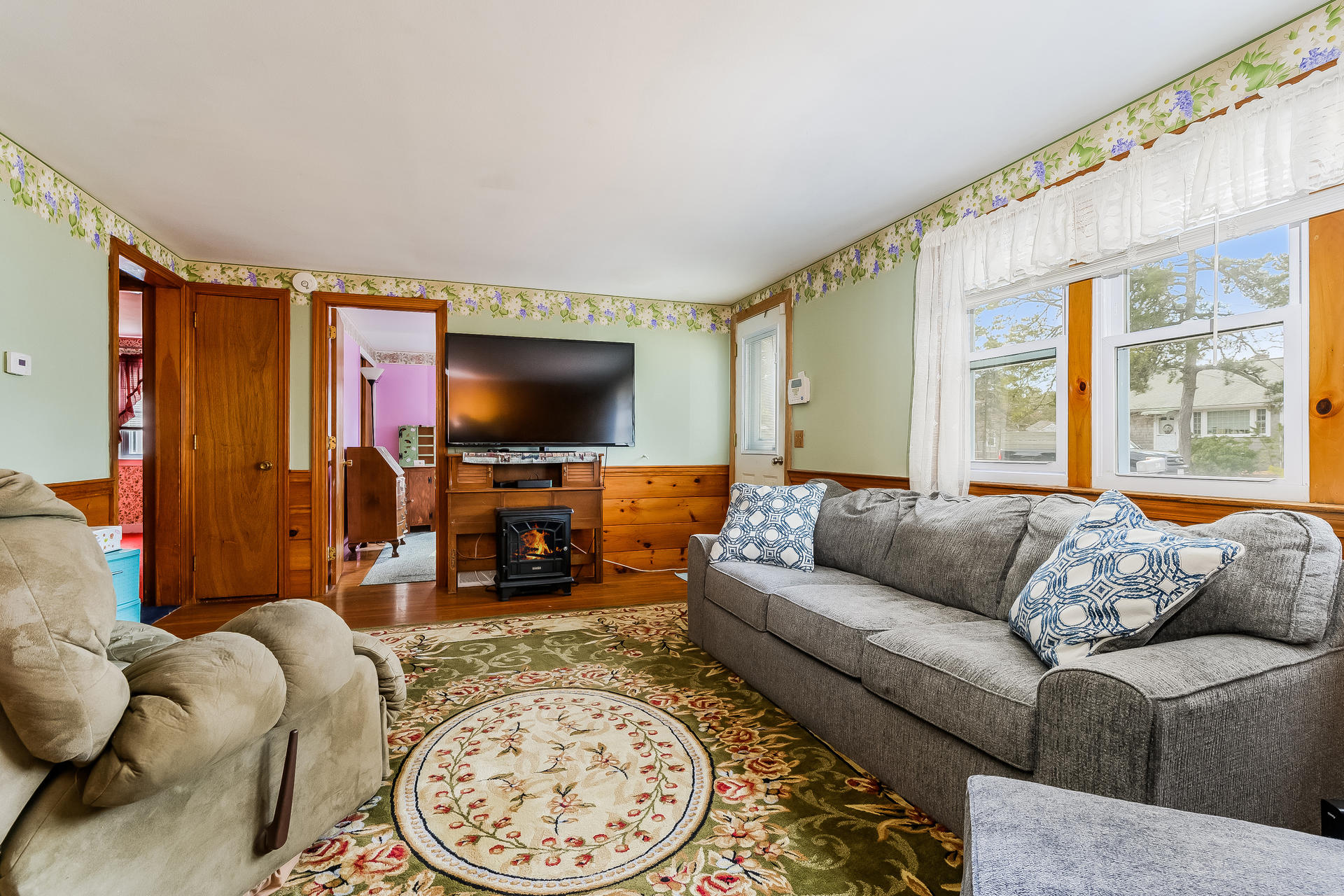 28 Lawrence Road Dennis Port, MA 02639 - Photo 8 of 20 a living room with furniture and a flat screen tv