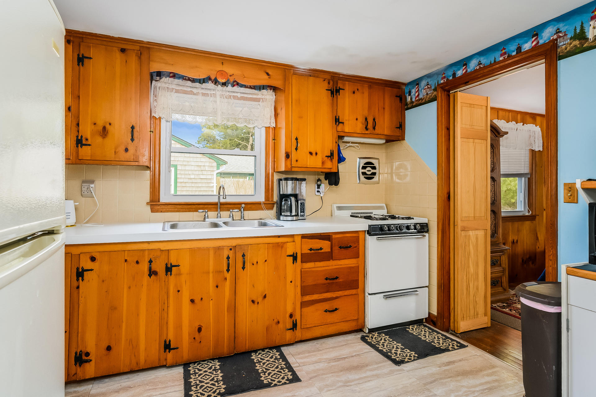 28 Lawrence Road Dennis Port, MA 02639 - Photo 9 of 20 a kitchen with stainless steel appliances granite countertop a refrigerator and a sink
