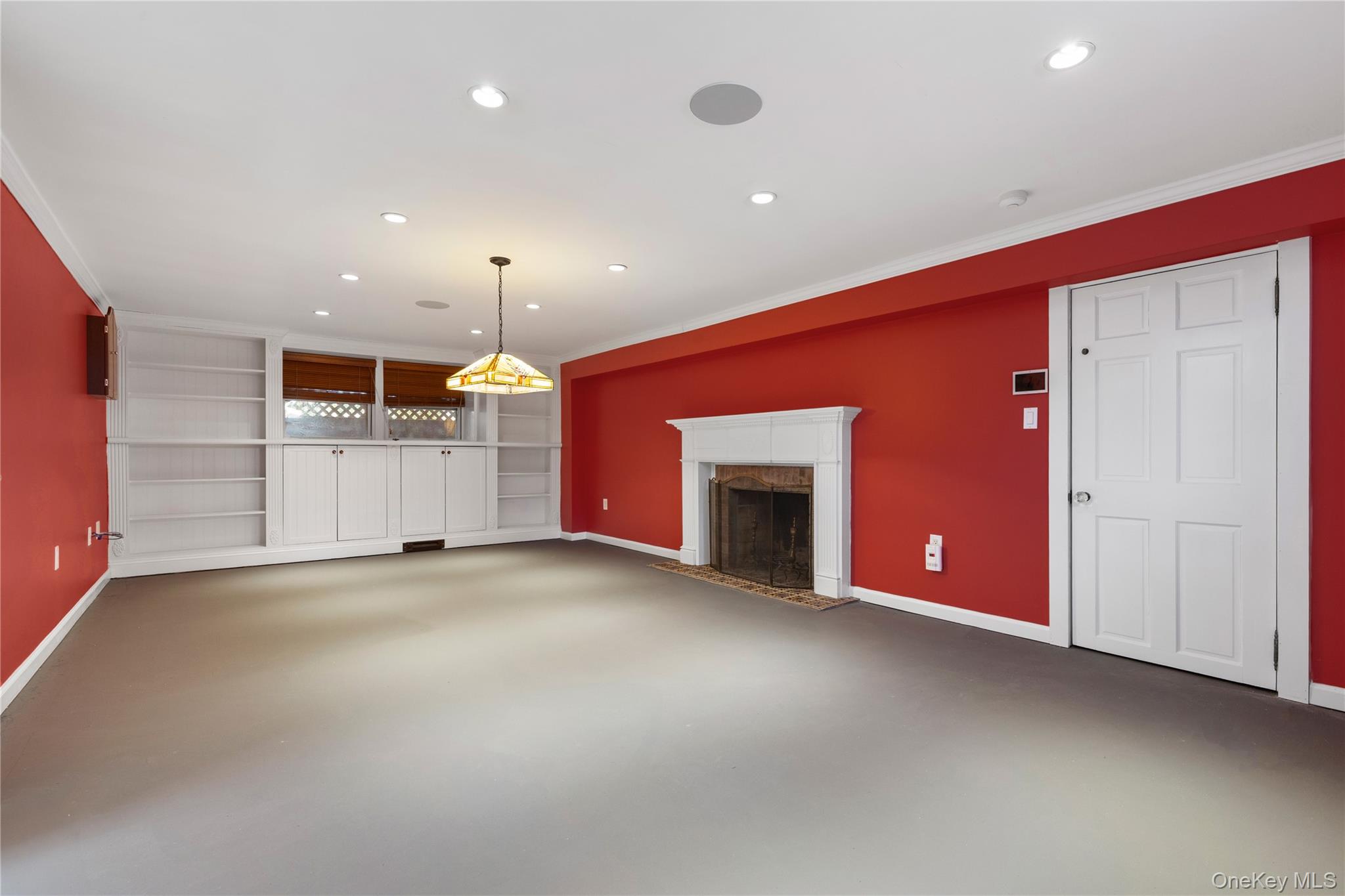 103 Pleasant Ridge Road Harrison, NY 10528 - Photo 33 of 39 Billiard room/office features custom built-ins, fireplace and door to additional storage room