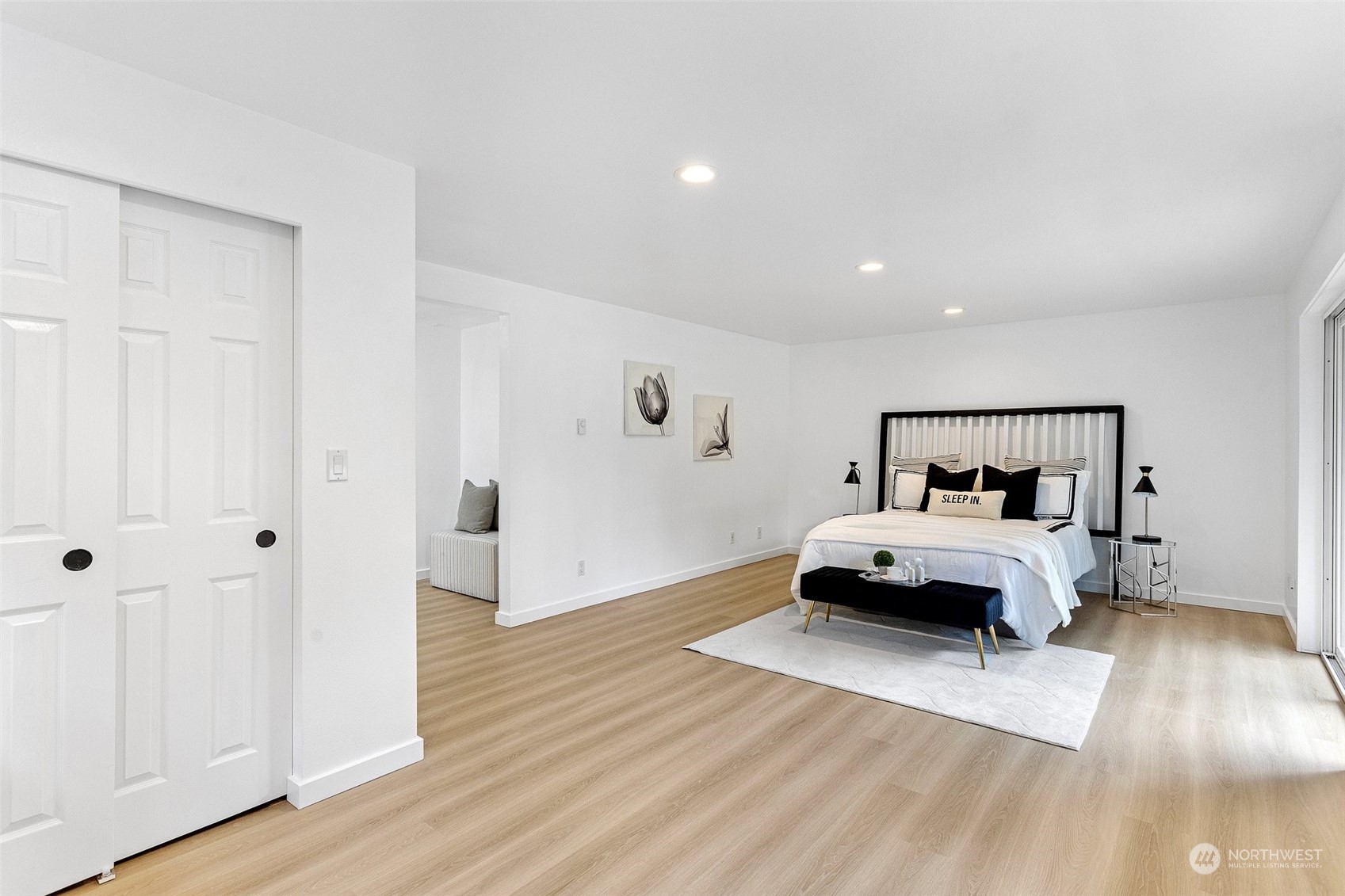 4714 200th Street Southeast Bothell, WA 98012 - Photo 11 of 27 a view of bedroom with a bed and wooden floor