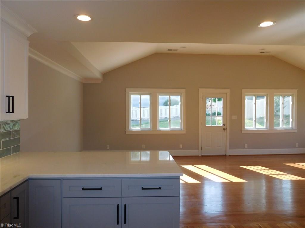 3545 Milhaven Road Winston-Salem, NC 27106 - Photo 12 of 30 Looking past the pennisula into the Family area. This home flows really well and will function nicley while entertaining.