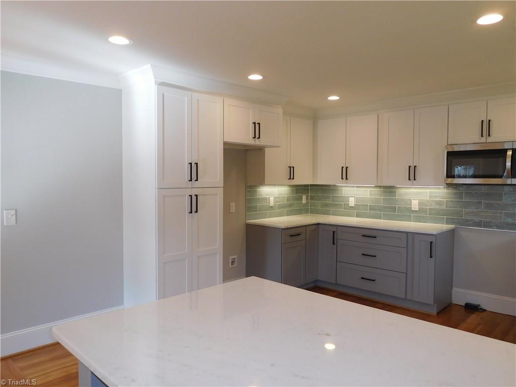 3545 Milhaven Road Winston-Salem, NC 27106 - Photo 10 of 30 Plenty of Storage in this Kitchen as well as workspace.