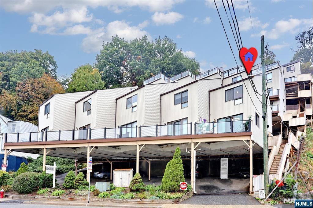 1110 River Road, Unit 105 Edgewater, NJ 07020 - Photo 1 of 19 a front view of building with retail shops