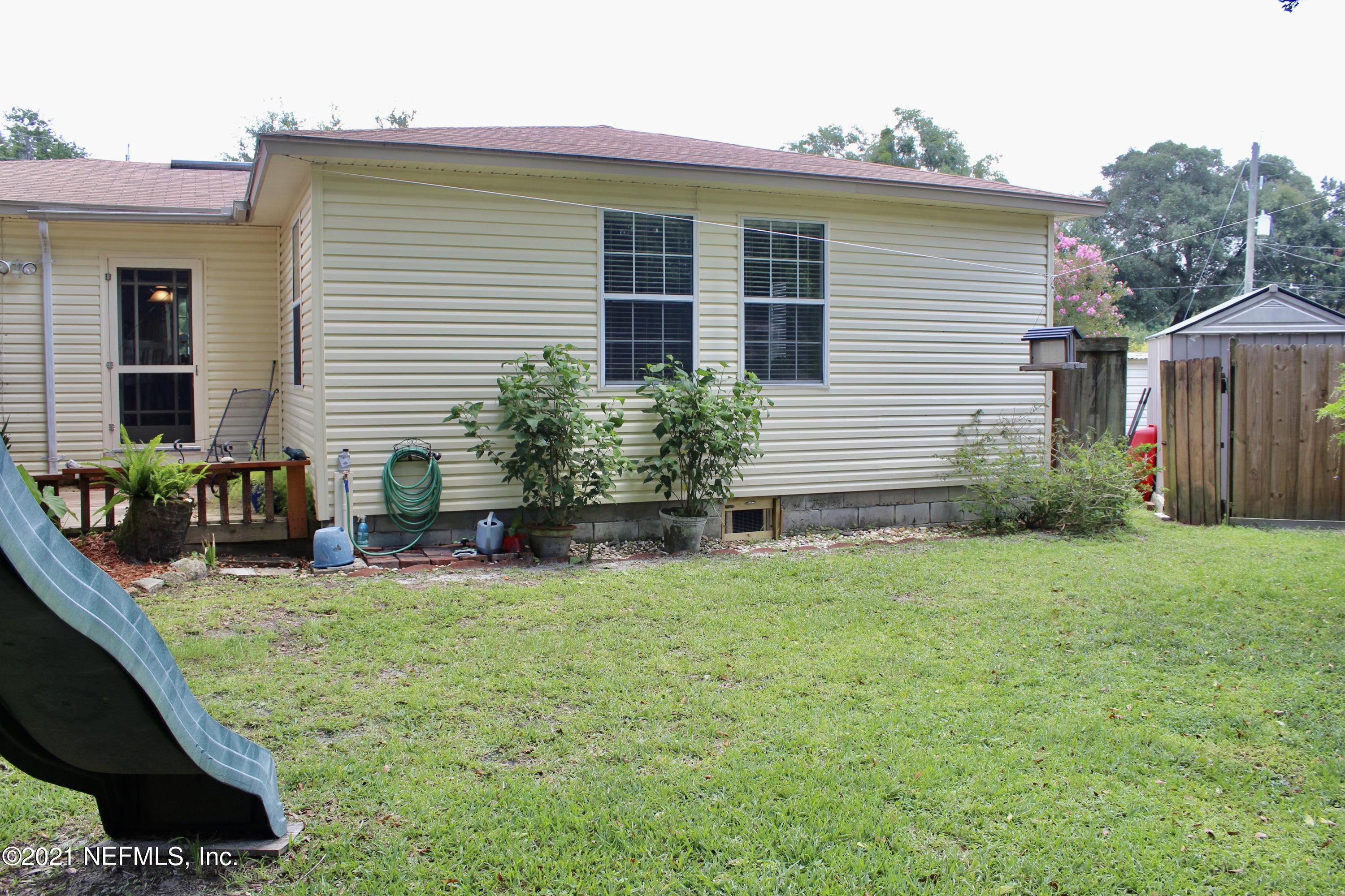 1840 Cornell Road Jacksonville, FL 32207 - Photo 24 of 24 a view of a house with backyard and sitting area