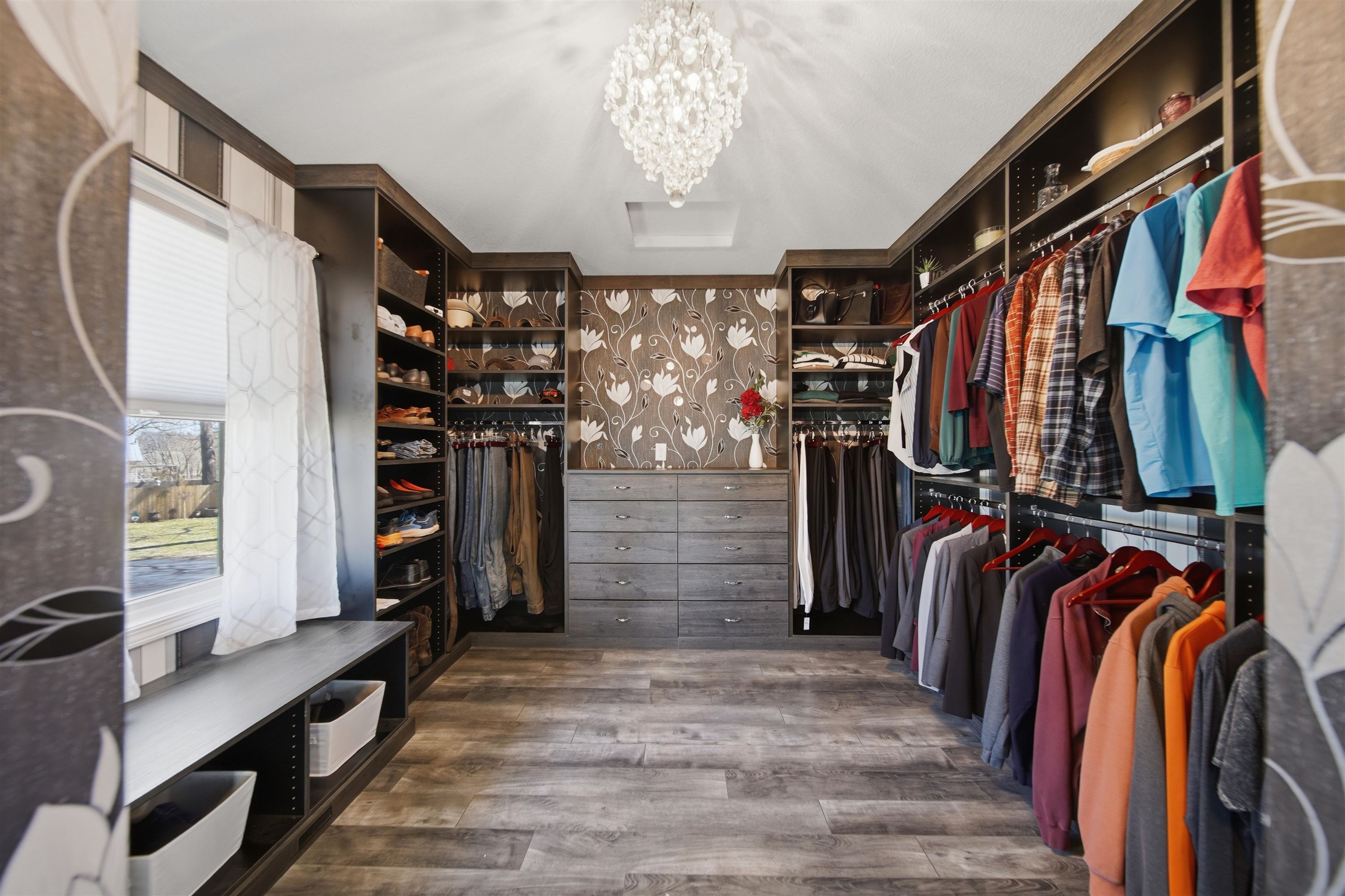 5287 East Canfield (5 Ac) Road Chana, IL 61015 - Photo 16 of 45 a view of walk in closet with clothes and shoes