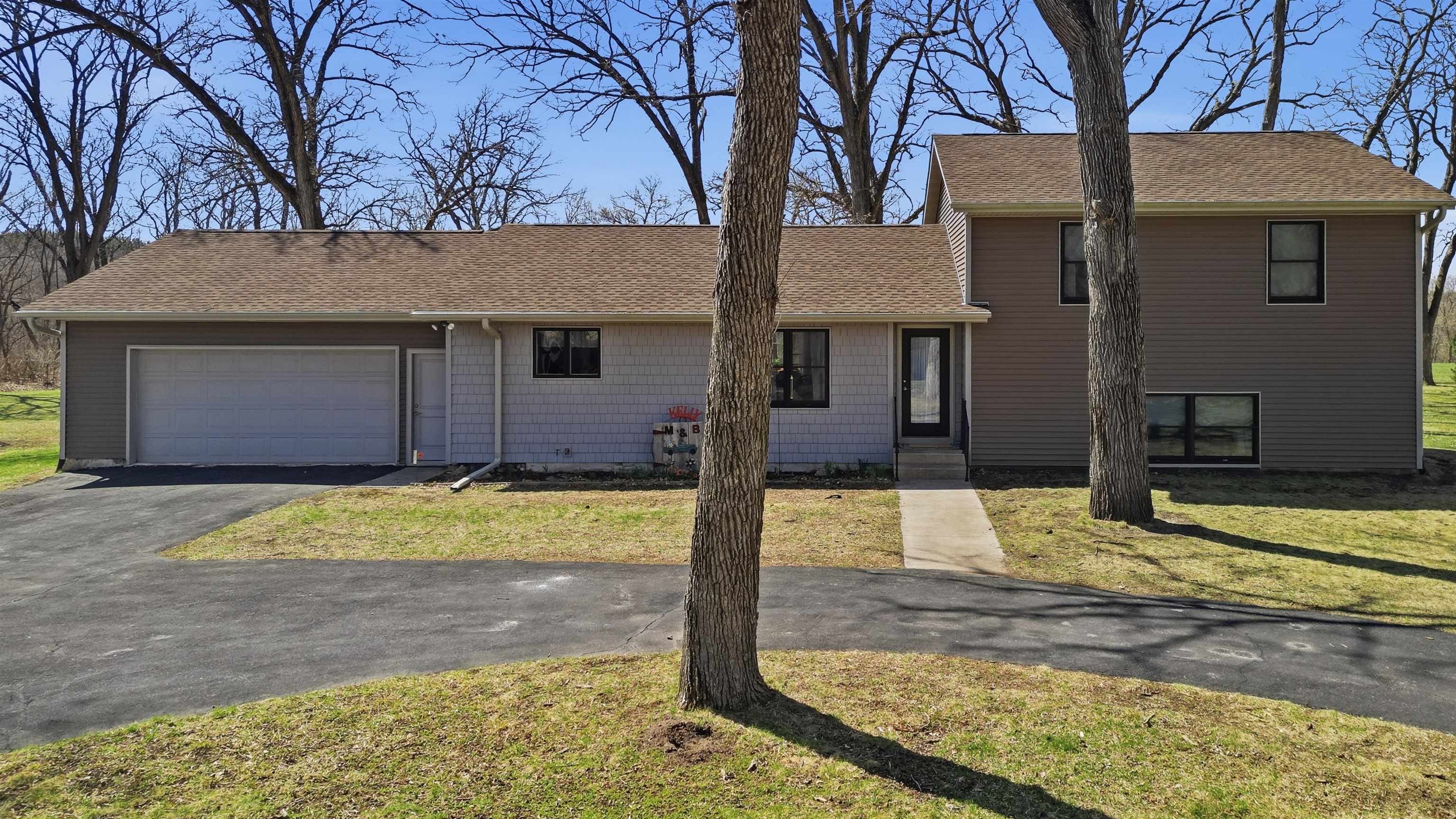 5287 East Canfield (5 Ac) Road Chana, IL 61015 - Photo 34 of 45 a view of a house with snow on the road