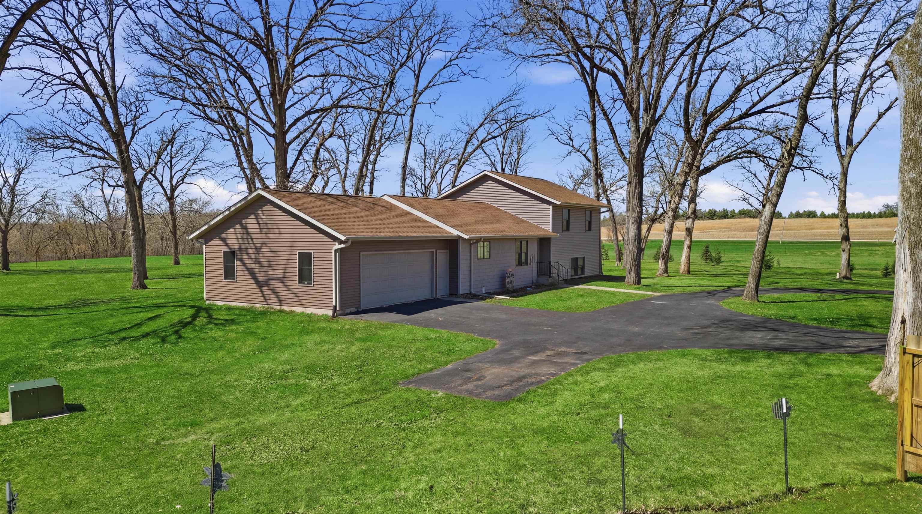 5287 East Canfield (5 Ac) Road Chana, IL 61015 - Photo 37 of 45 a view of a house with yard and tree s
