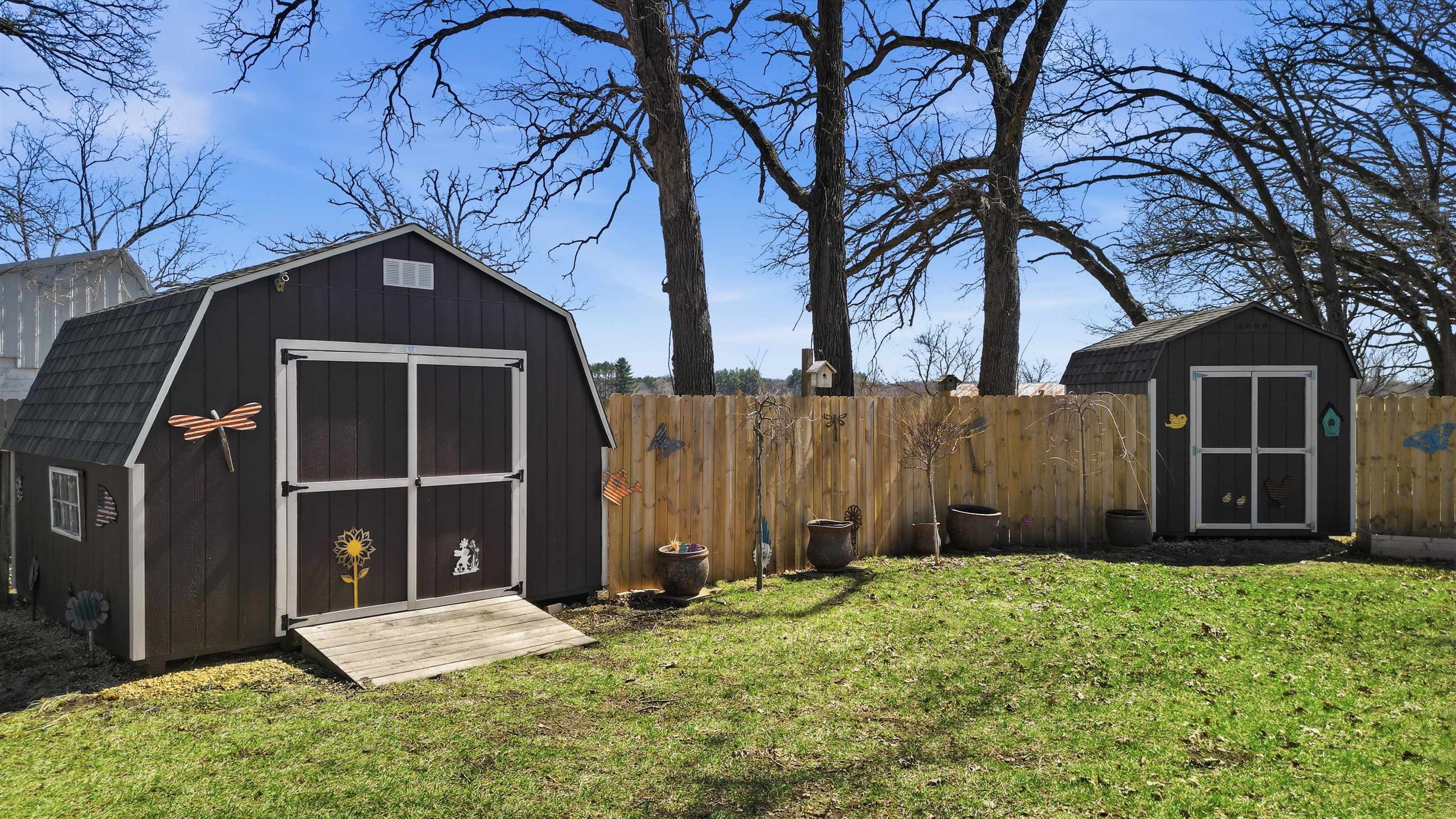 5287 East Canfield (5 Ac) Road Chana, IL 61015 - Photo 44 of 45 a front view of a house with garden