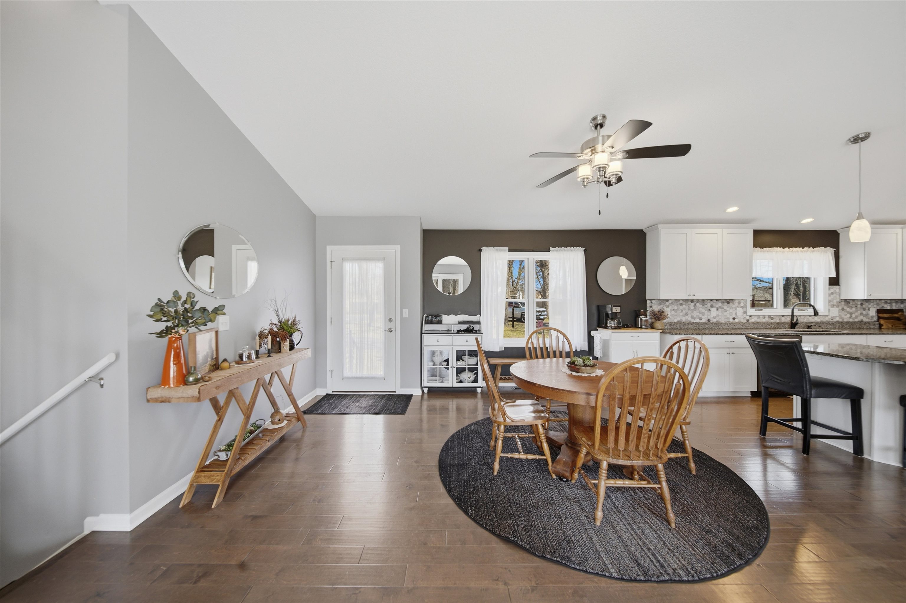 5287 East Canfield (5 Ac) Road Chana, IL 61015 - Photo 5 of 45 a view of a dining room with furniture window and wooden floor