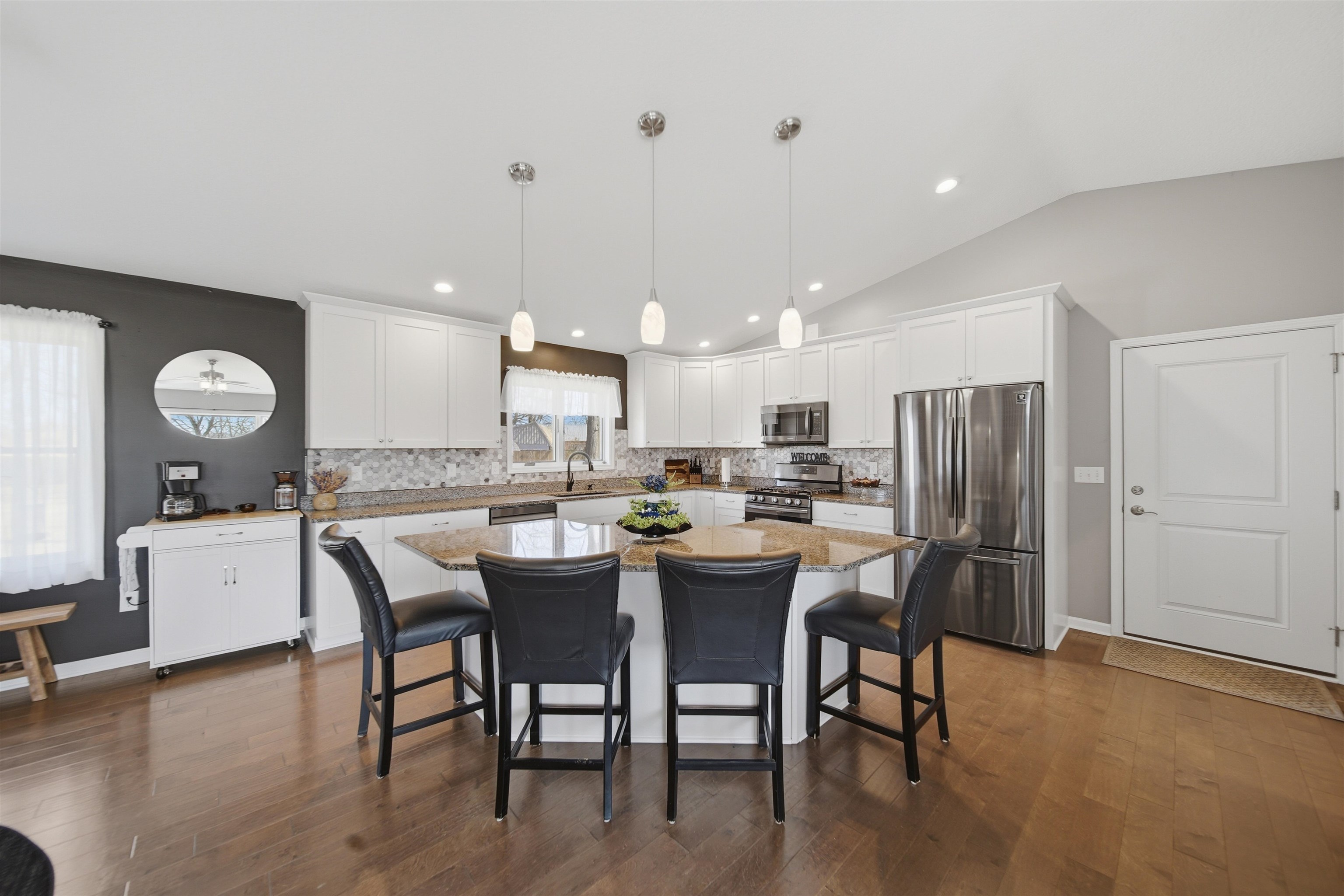 5287 East Canfield (5 Ac) Road Chana, IL 61015 - Photo 6 of 45 a large kitchen with a table and chairs