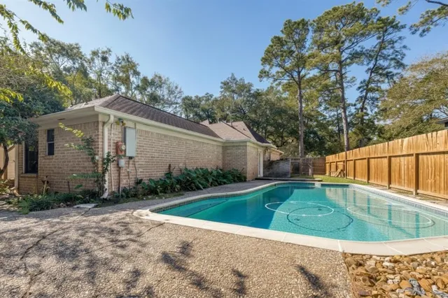 a view of backyard with green space