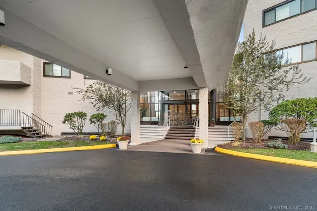 a view of swimming pool with outdoor seating