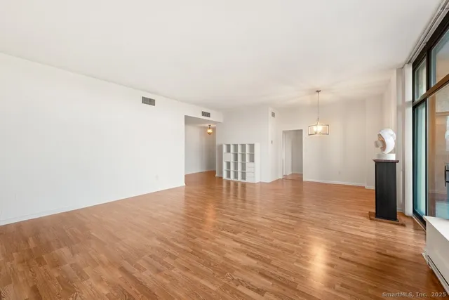 a view of a livingroom with wooden floor