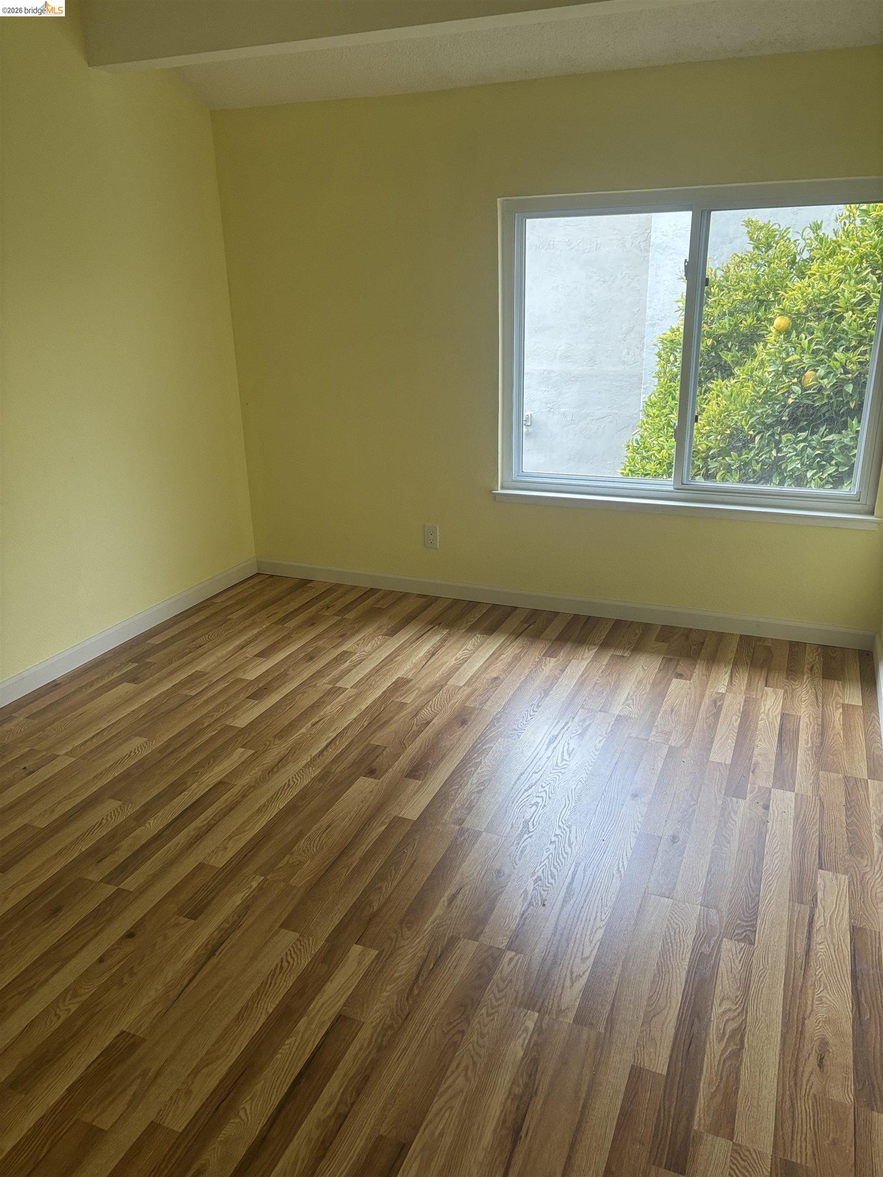 10013 Foxboro Circle San Ramon, CA 94583 - Photo 30 of 39 a view of an empty room and wooden floor