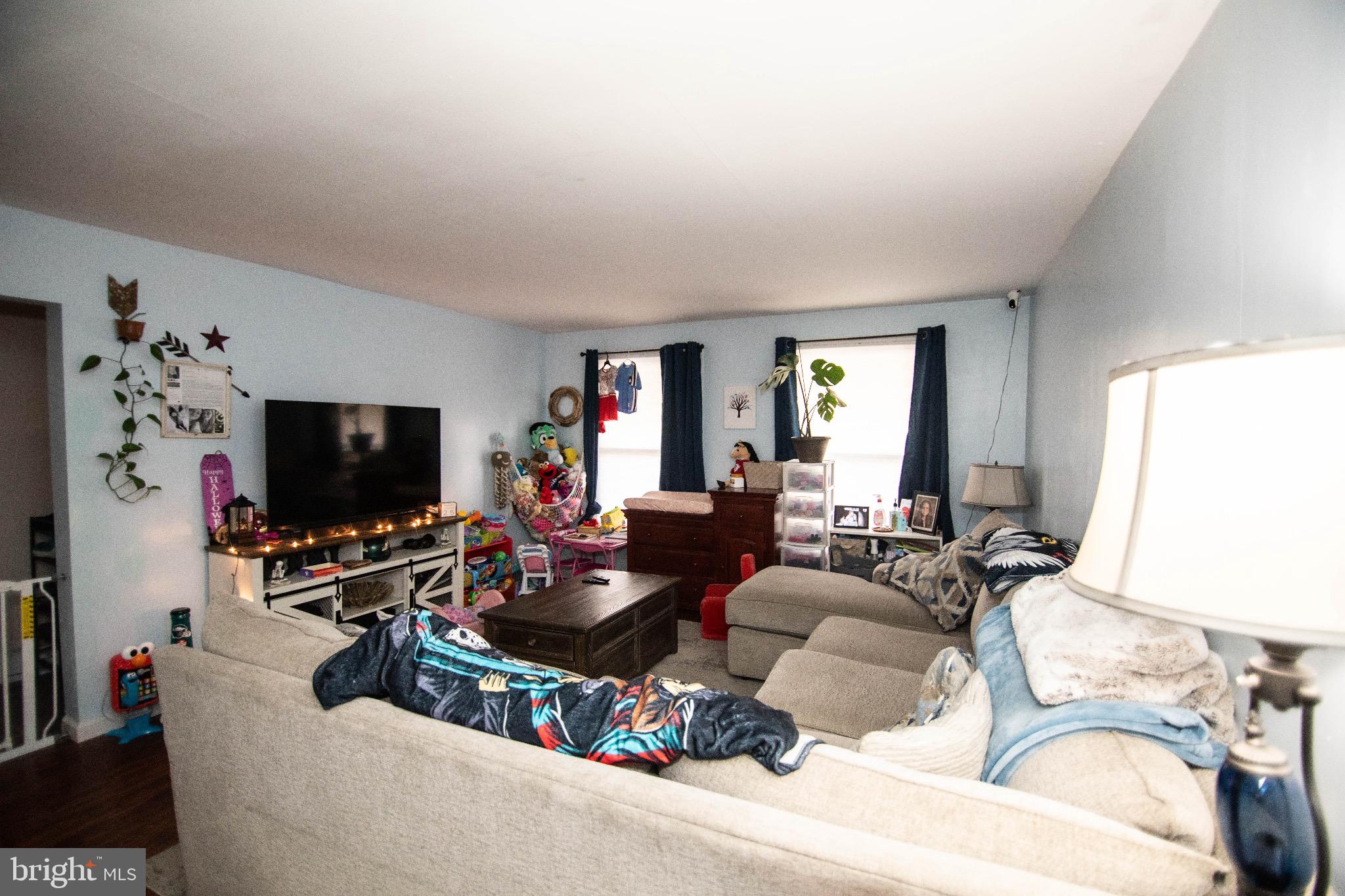 12 South 3rd Street Newport, PA 17074 - Photo 10 of 12 a living room with furniture and a flat screen tv