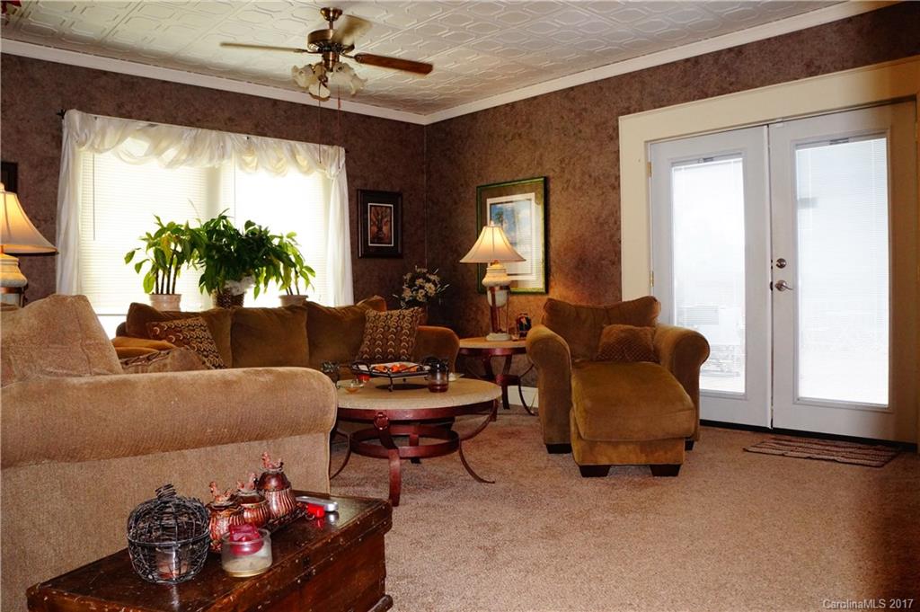 1396 Springdale Road, Unit 4/A Lancaster, SC 29720 - Photo 15 of 23 a living room with furniture and a large window