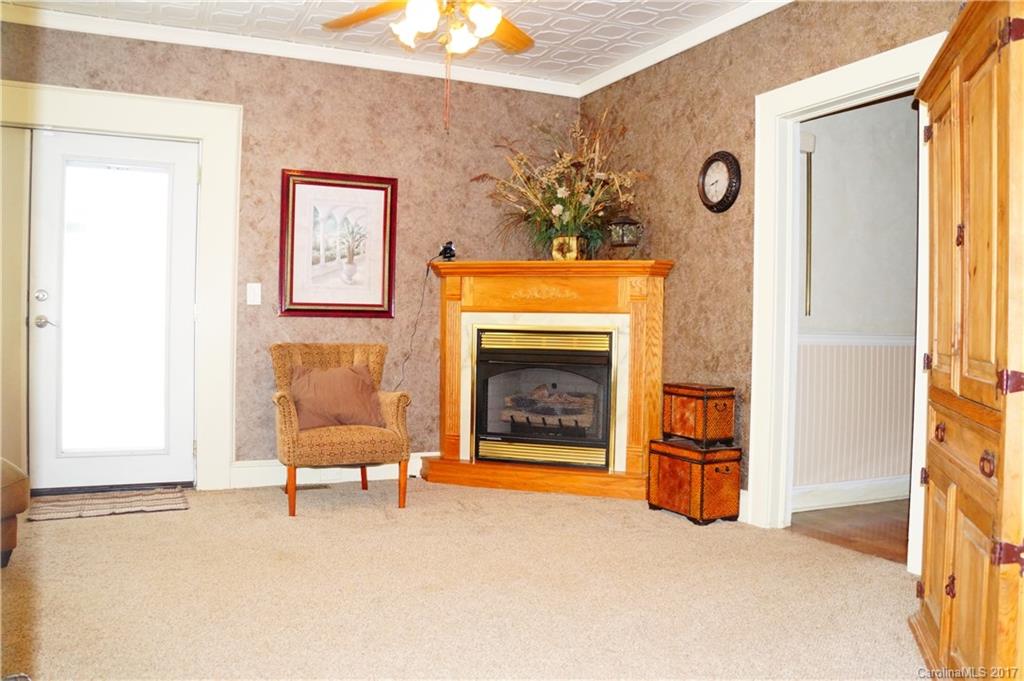 1396 Springdale Road, Unit 4/A Lancaster, SC 29720 - Photo 17 of 23 a living room with furniture and a fireplace